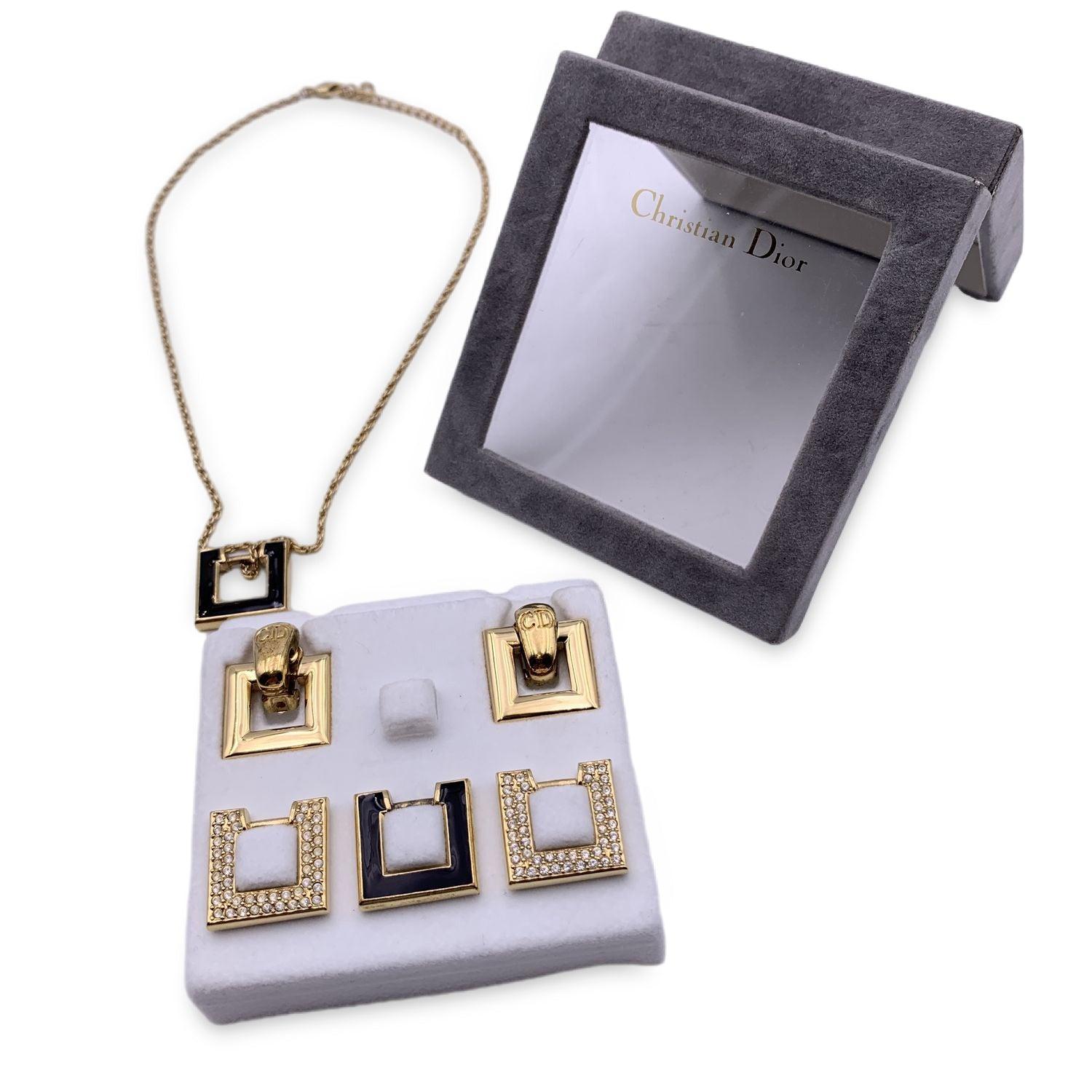 A wonderful vintage Christian Dior pendant necklace and intercheangeable jewelry set. It features 6 interchangeable squared elements in 3 different variants (gold metal, black enamel and crystals) . You can interchange the elements on the necklace