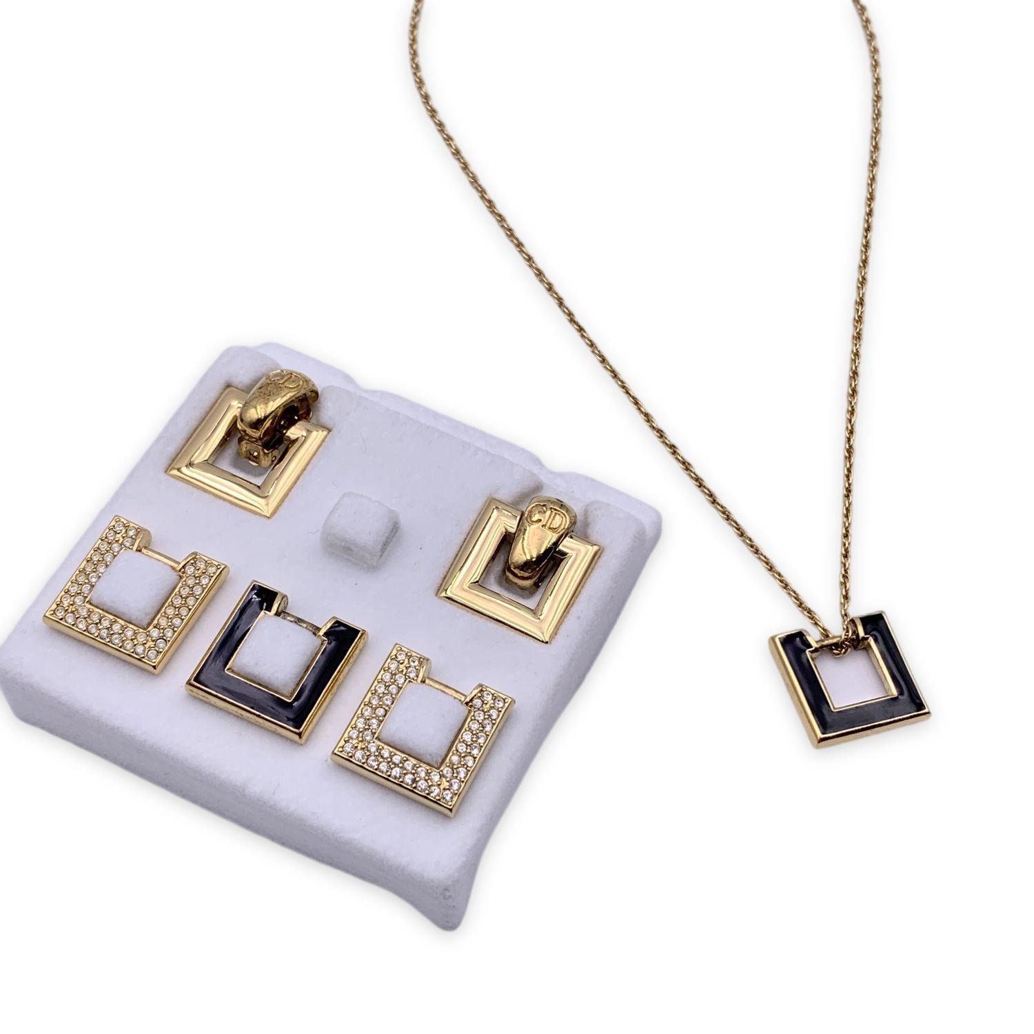 A wonderful vintage Christian Dior pendant necklace and intercheangeable jewelry set. It features 6 interchangeable squared elements in 3 different variants (gold metal, black enamel and crystals) . you can interchange the elements on the necklace