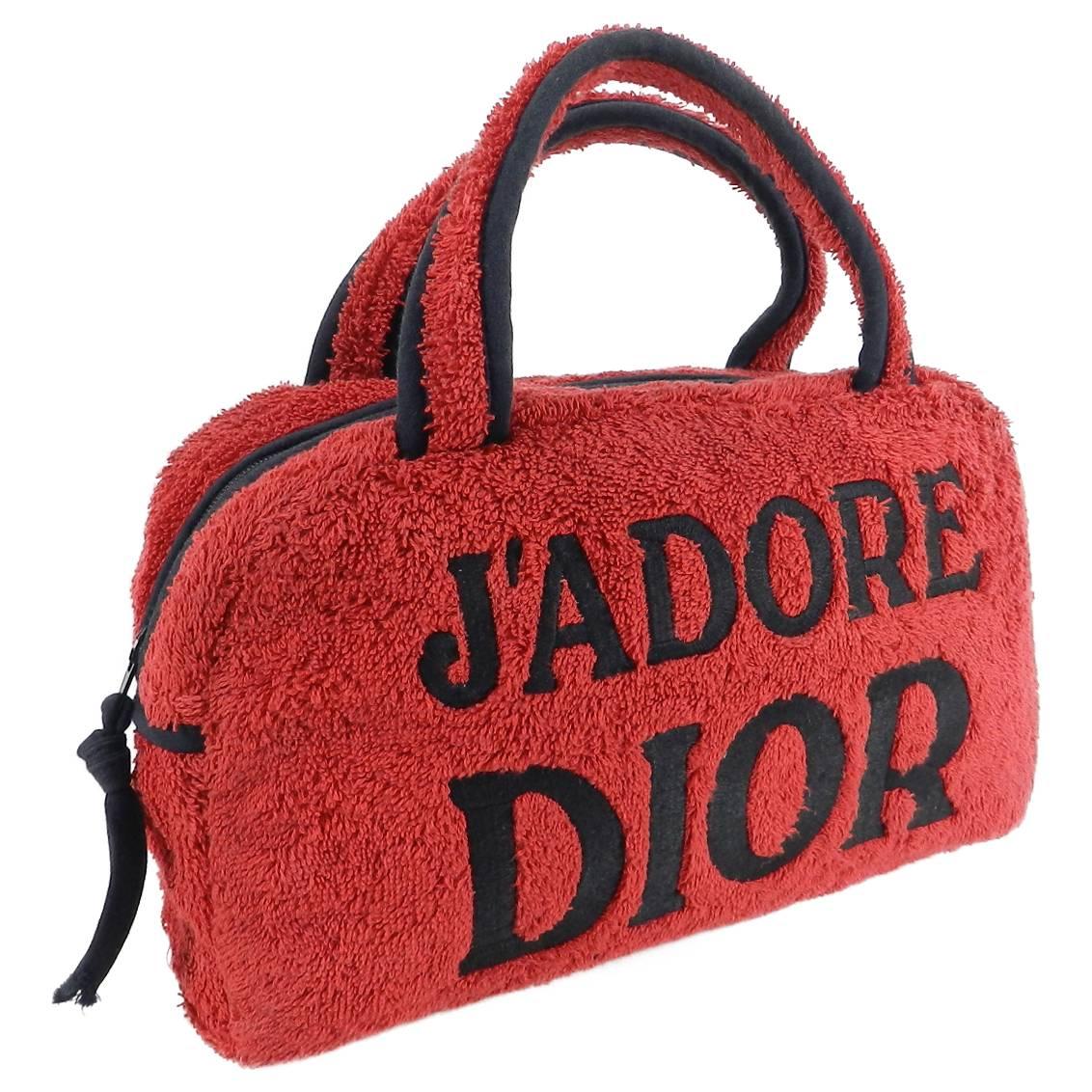 Christian Dior Vintage J'adore Dior Red Terry cloth Small Bag.  Circa early 2000's John Galliano era. These were originally make-up cosmetic or toiletry bags that accompanied J'adore Dior perfume rather than sold as Dior label handbags. However this
