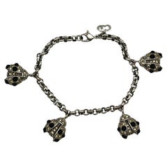 CHRISTIAN DIOR Bracelet breloque vintage en forme de coccinelle