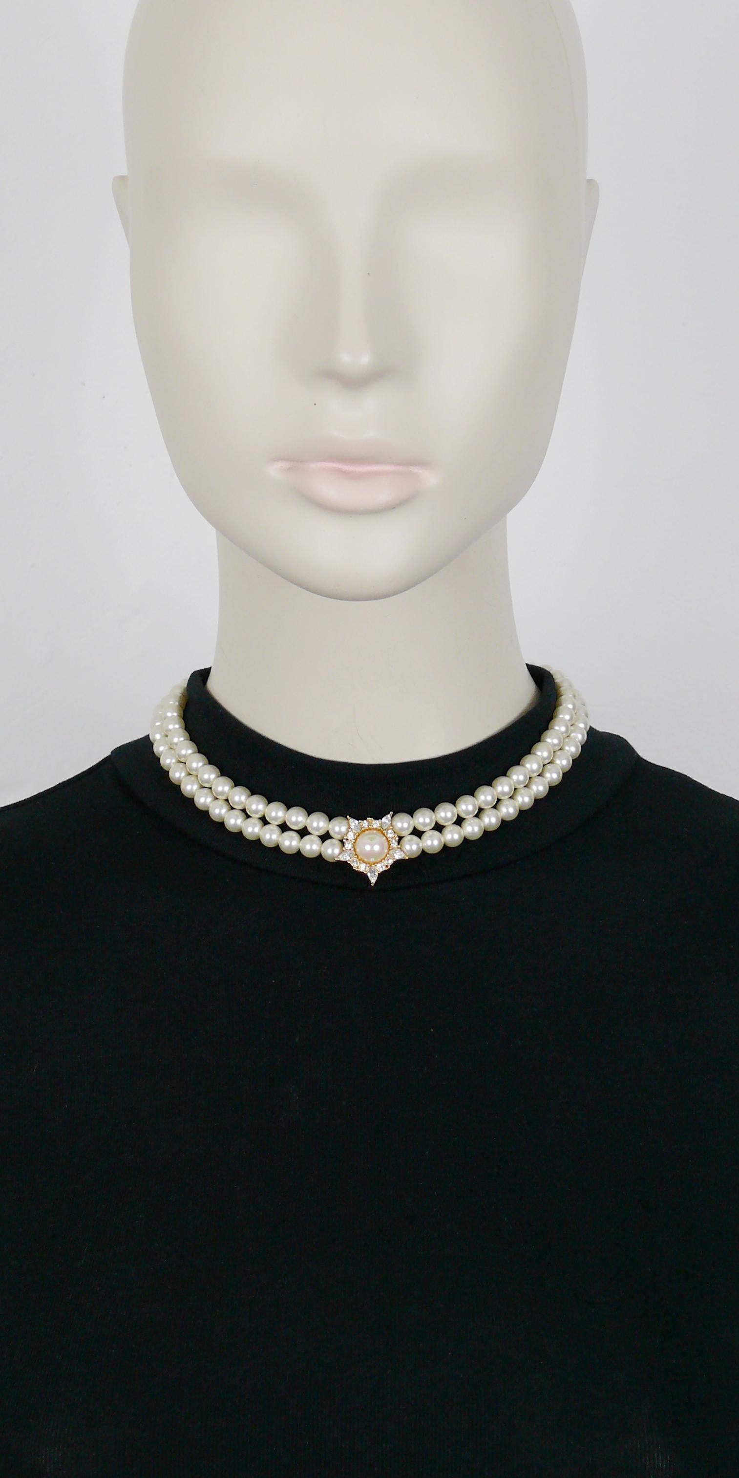 CHRISTIAN DIOR vintage two strands pearl necklace featuring a jewelled gold toned star-shaped center.

Secure clasp closure.
Extension chain.

Embossed CHR. DIOR © Germany.

Indicative measurements : length from approx. 36 cm (14.17 inches) to