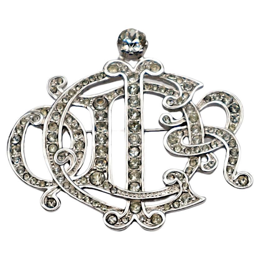 CHRISTIAN DIOR Vintage Jewelled Silver Tone Insigna Monogram Logo Brooch For Sale
