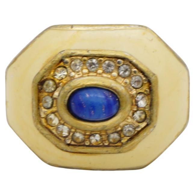 Christian Dior 1970s Vintage Unisex Lapis Navy Blue Oval Cabochon Yellow Octagon Crystals Cocktail Chunky Statement Ring US 7, Gold Tone

Good condition. Some scratches and colour loss. So price is very low. Vintage. 100% Genuine.

All stones are