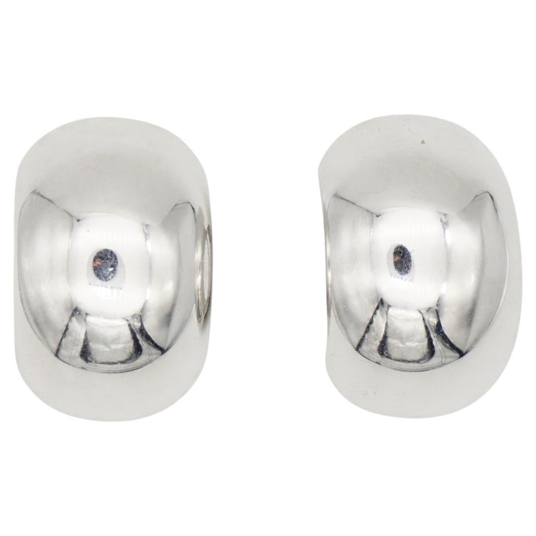 Christian Dior Vintage 1980s Unisex Large Glow Semi Circle Demi Dome Hoop Clip Earrings, Silver Tone

Very good condition. 100% Genuine.

A very beautiful pair of earrings by Chr. DIOR, signed at the back.

Size: 2.9*1.9 cm.

Weight: 8.0 g/each.

_