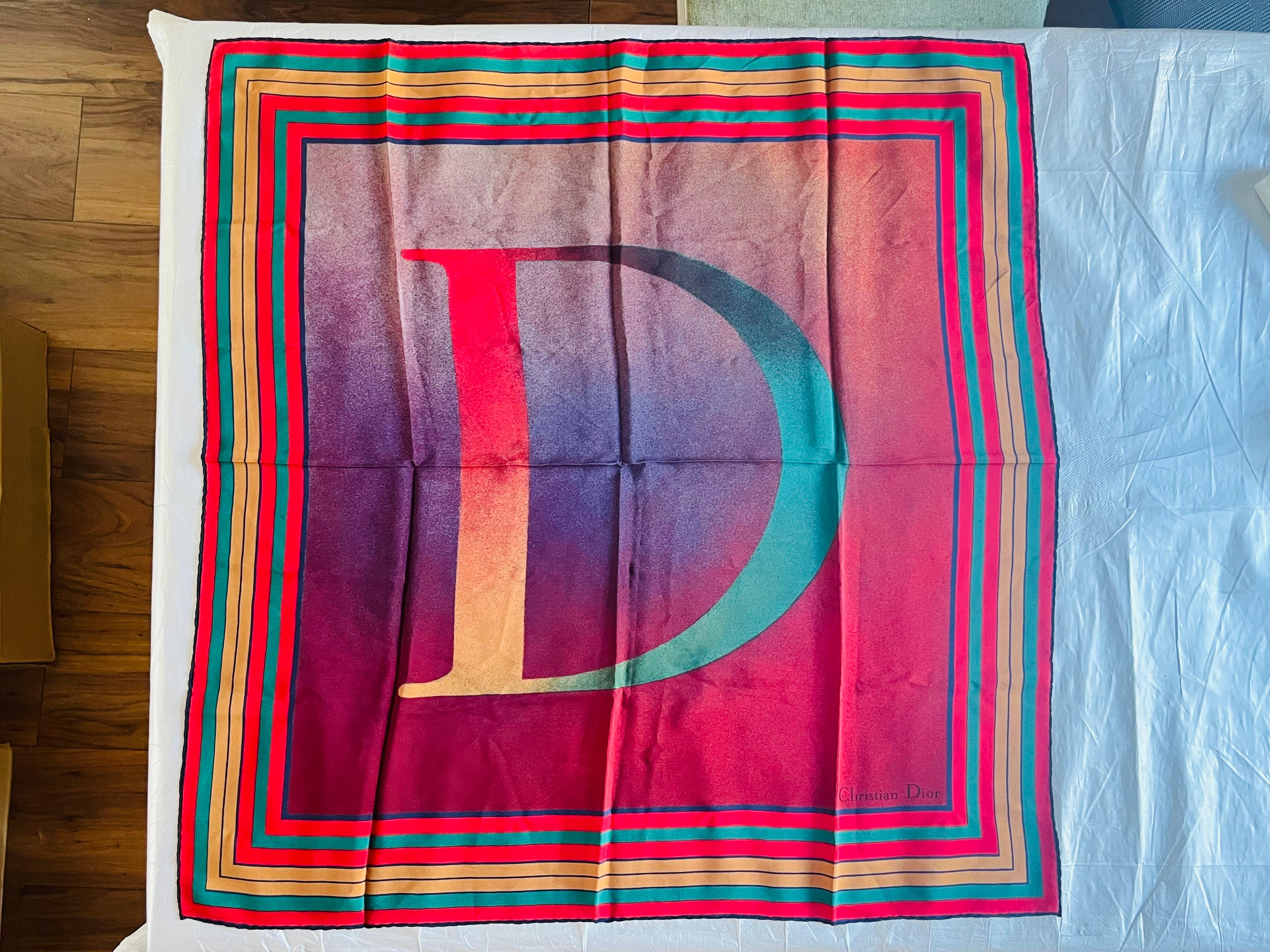Christian Dior Vintage Large Logo D Airbrush Red Green Yellow Gradient Square Silk Scarf

Vintage, new and never used. 100% Genuine.

Size: 75*75 cm.

Lightweight.

Dry Clean.

_ _ _

Great for everyday wear. Come with velvet pouch and beautiful