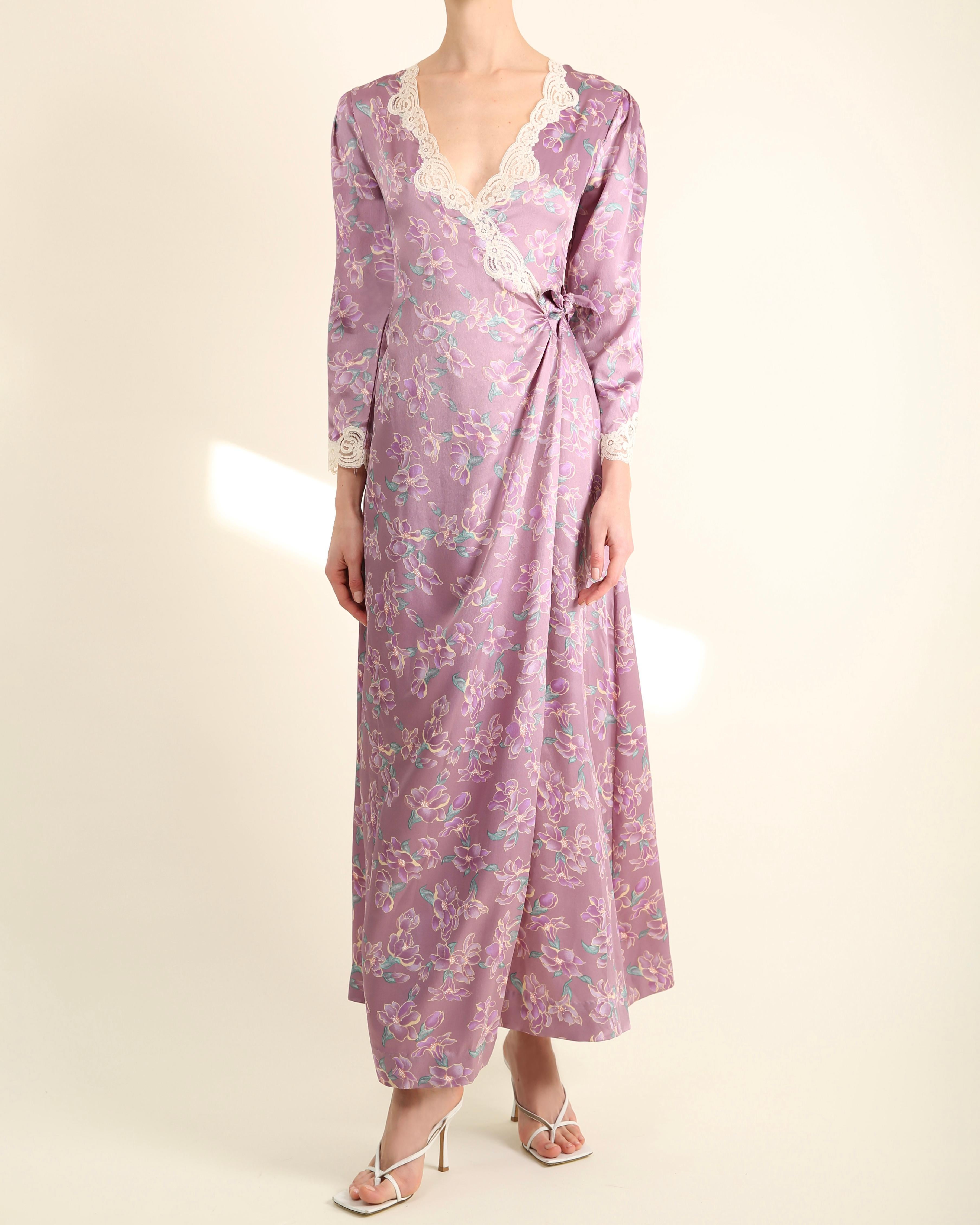 LOVE LALI Vintage

An extremely beautiful and very rare vintage robe from Christian Dior that can quite easily be worn in an evening as a dress.
It's a gorgeous colour of lilac with floral print in turquoise, taupe, peach and white with ivory lace