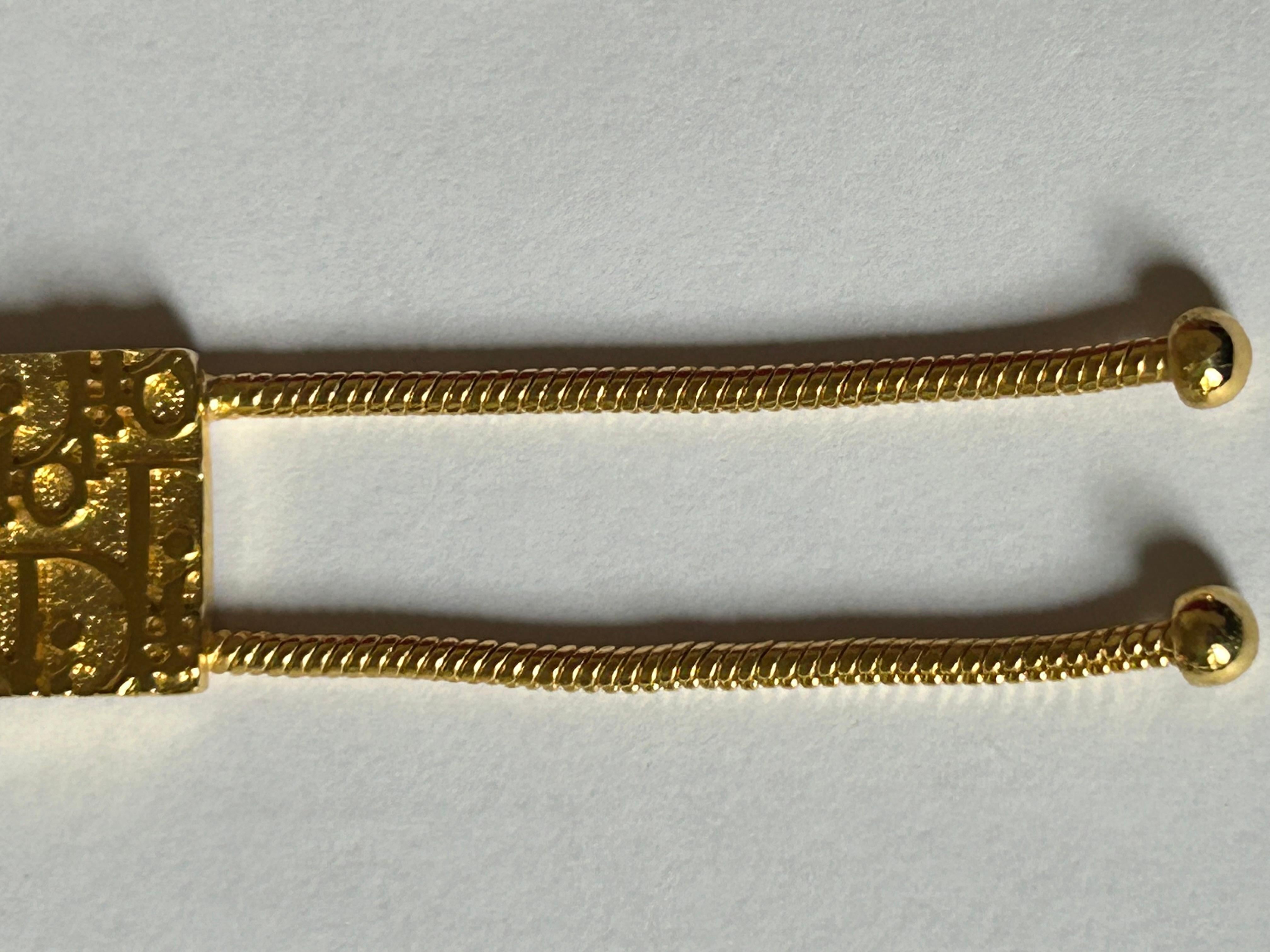 Women's Christian Dior Vintage Logo Sign Trotter Oblique Monogram Gold Lariat Necklace For Sale