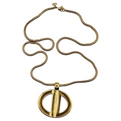 CHRISTIAN DIOR Collier pendentif vintage en or massif avec logo CD