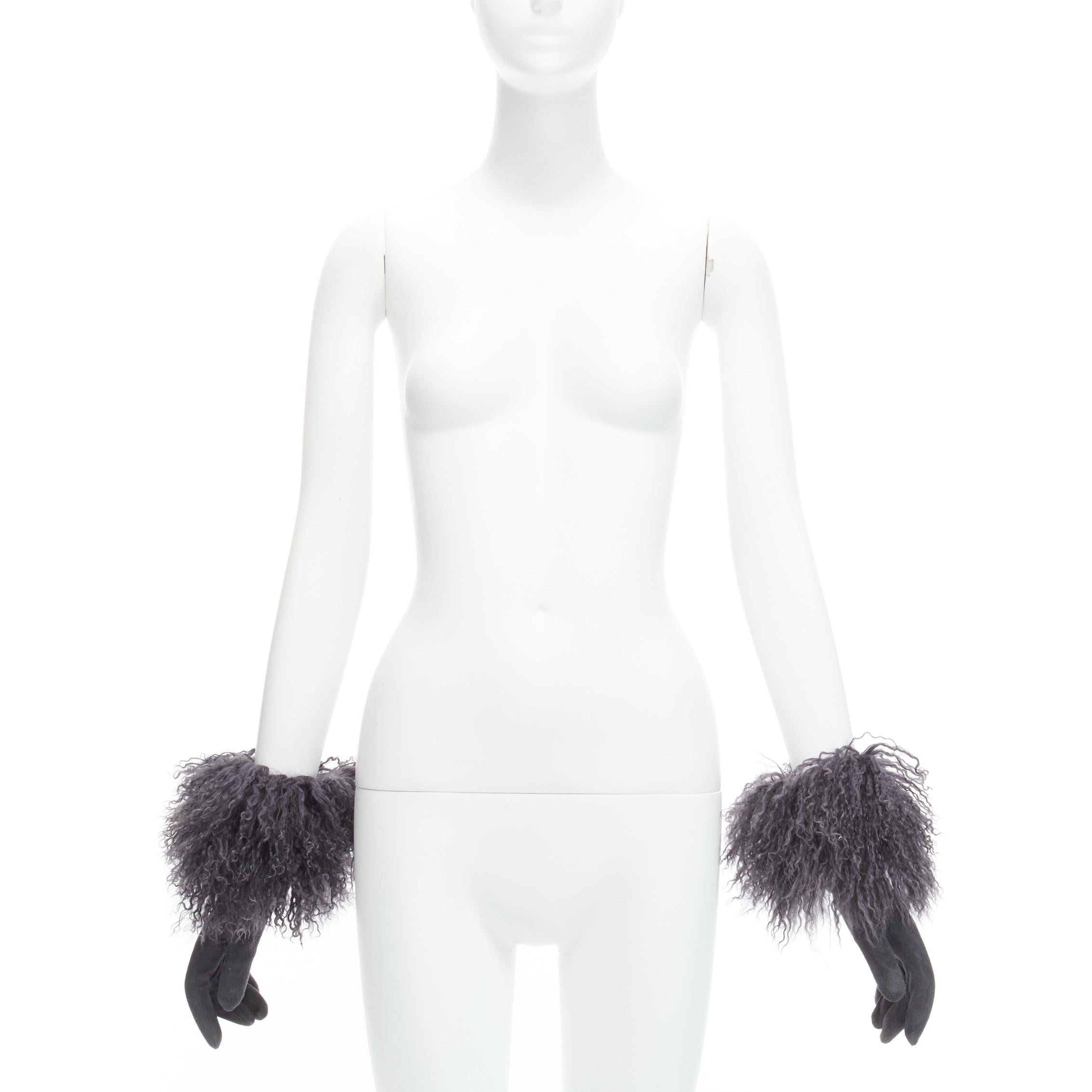 CHRISTIAN DIOR Vintage grey Mongolian shearling fur suede lace panel gloves US7.5
Reference: GIYG/A00377
Brand: Christian Dior
Designer: John Galliano
Material: Leather, Lace
Color: Grey, Black
Pattern: Lace
Closure: Snap Buttons
Lining: Black