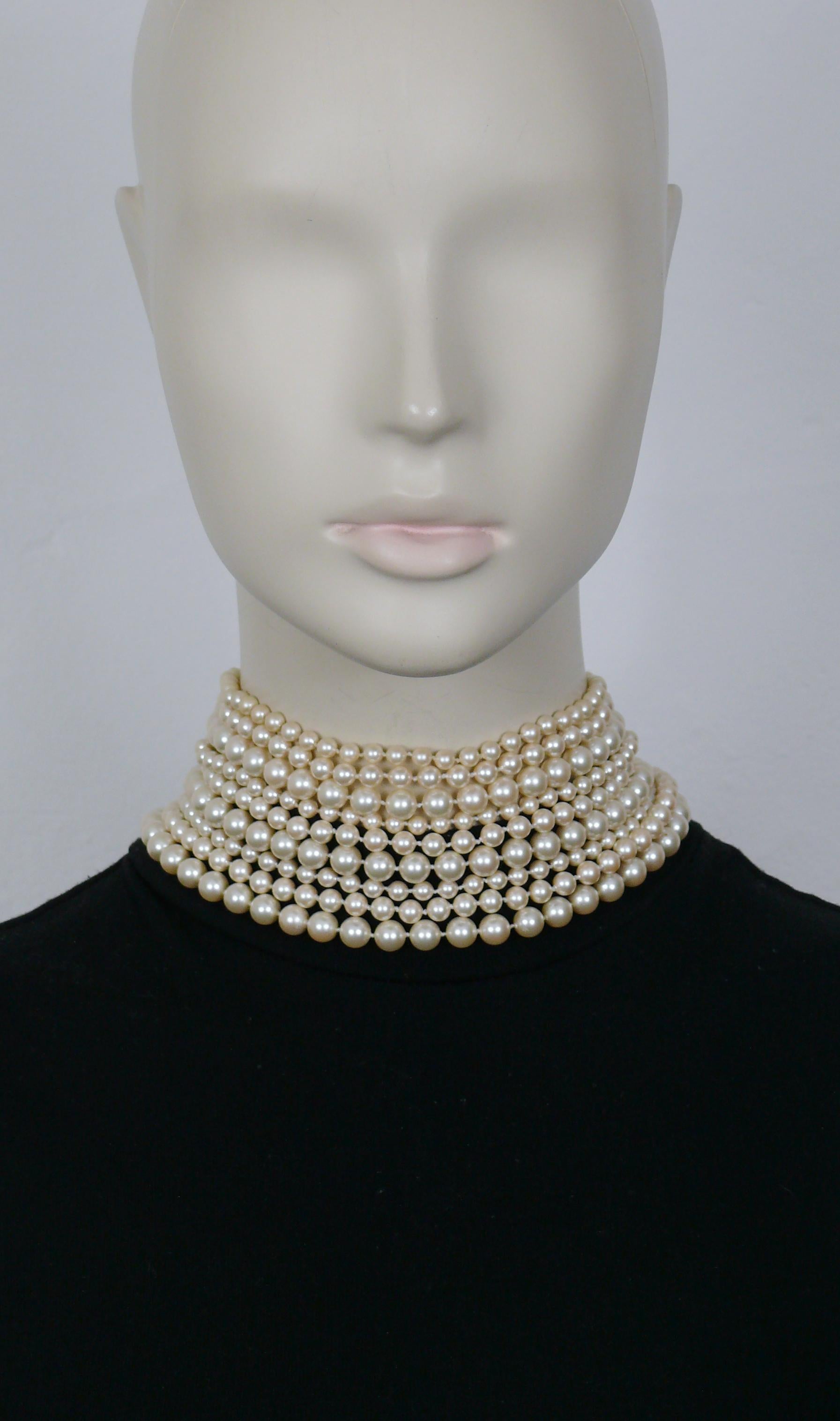 CHRISTIAN DIOR vintage nine strand faux pearl necklace of different sizes.

Double lobster clasp closure.
Extension chains.
Possibility of different styles depending on the length and the size of your neck (see examples on the pictures 2, 4 and