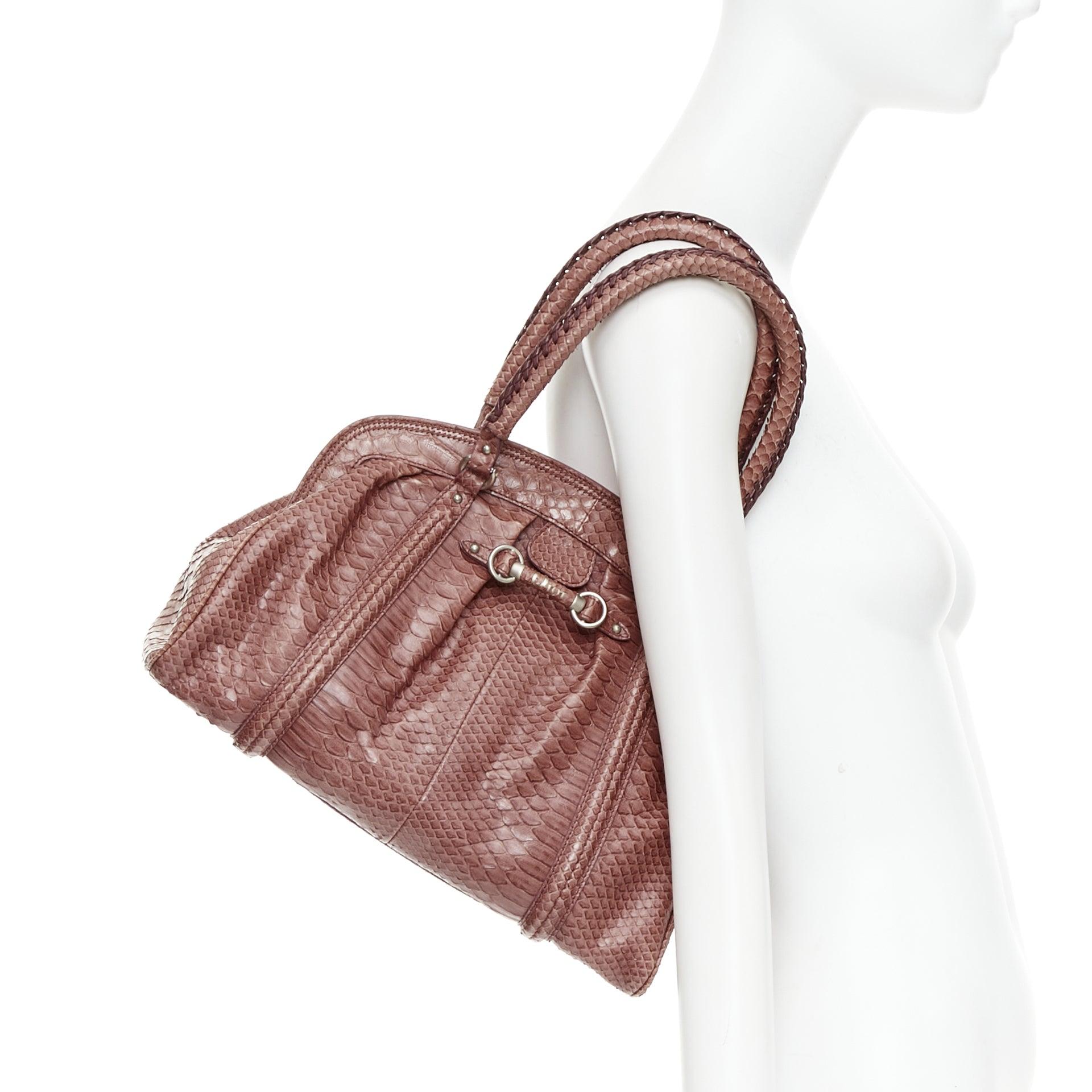 CHRISTIAN DIOR Vintage My Frame dark red genuine scaled leather top handle bag
Reference: TGAS/E00981
Brand: Dior
Designer: John Galliano
Model: My Dior Frame
Material: Leather
Color: Burgundy, Silver
Pattern: Animal Print
Closure: Magnet
Lining: