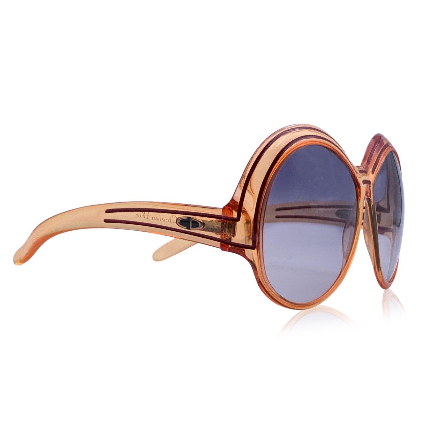 Vintage Christian Dior oversize sunglasses, Mod. 2040 - Col 30. Orange Optyl frame with red striped detailing. Original 100% Total UVA/UVB protection in gradient Grey color. CD logo on temples. Made in Germany Condition A+ - MINT NEW OLD STOCK -