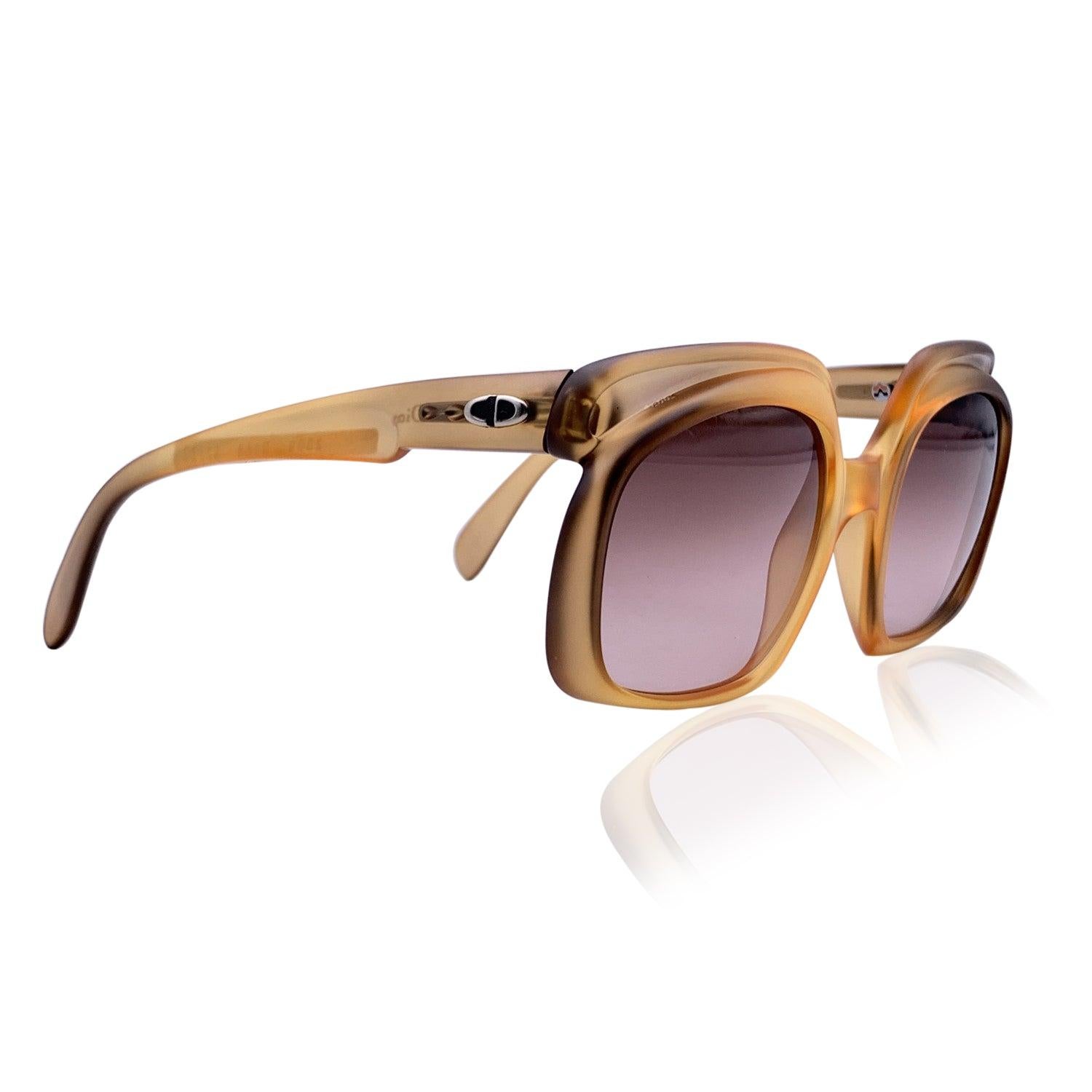 Radiating pure retro charm, these Vintage Christian Dior Oversize Sunglasses, Model 2009 - Color D 368, are a true statement from Dior's golden era of eyewear. Made in Germany and crafted from the brand's signature Optyl, the oversized frame