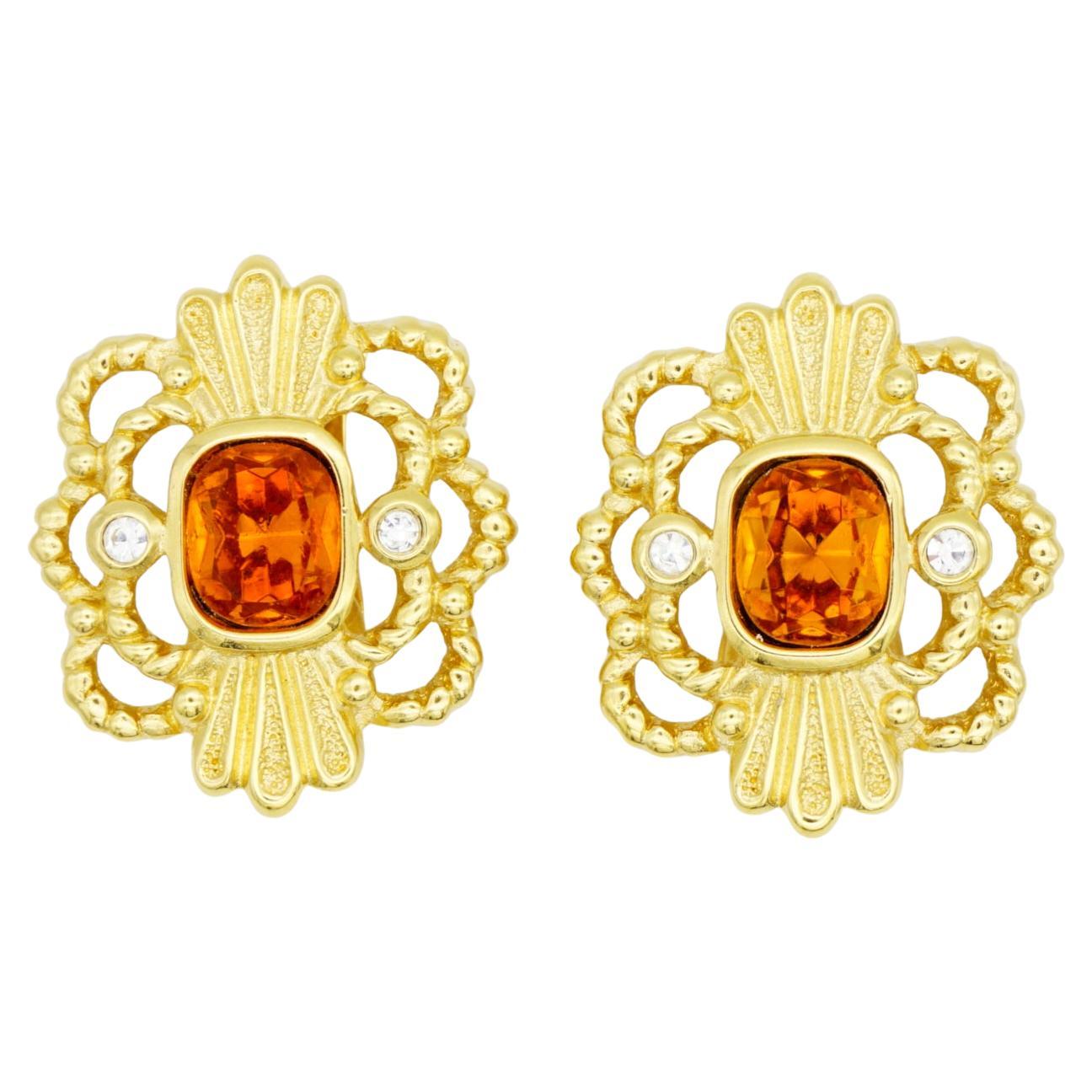 Christian Dior Vintage Boucles d
oreilles clip fleur ovale en cristal de citrine et topaze ajourée