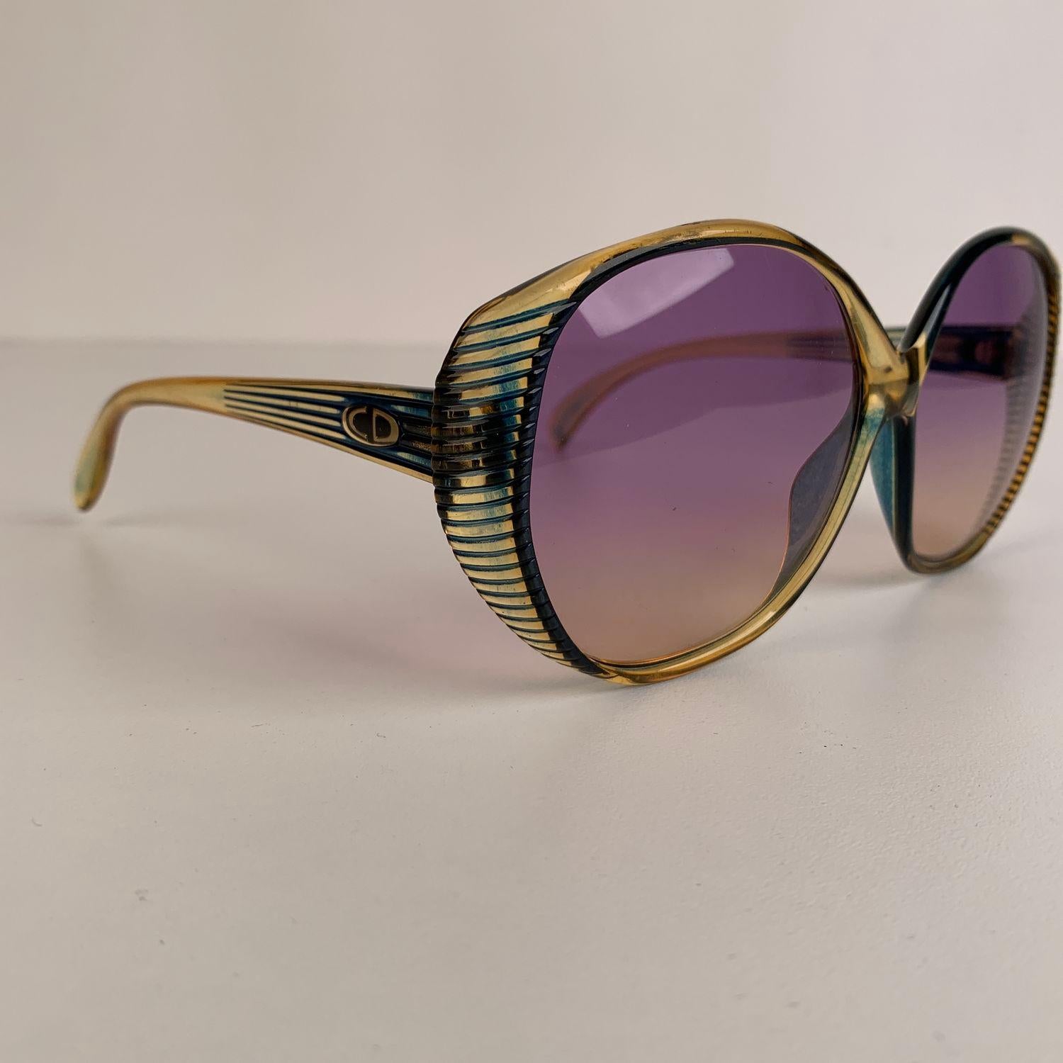 CHRISTIAN DIOR Vintage 1970s Oversized green and semi transparent honey color frame. Bicolor (purple and yellow - gradient) new lenses. Optyl frame, handmade in Germany.



Details

MATERIAL: Optyl

COLOR: Green

MODEL: 2061

GENDER: Women

SIZE: