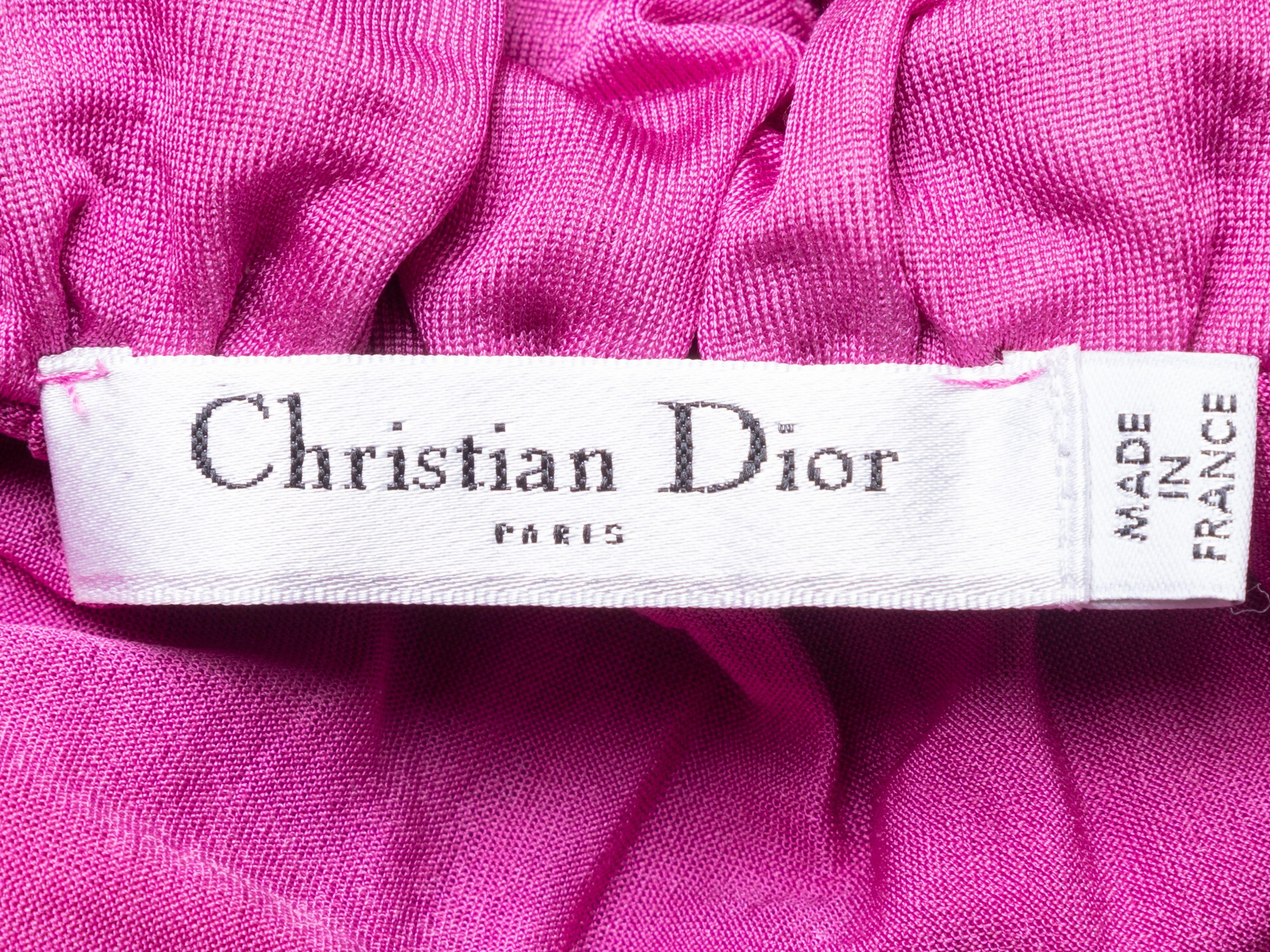 Product Details: Vintage pink cap sleeve top by Christian Dior. Scoop neckline featuring ruffle trim. 30