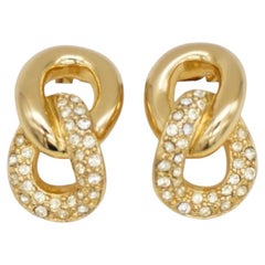 Orecchini Christian Dior vintage in oro con cristalli rari, a forma di nodo intrecciato e cerchi intrecciati