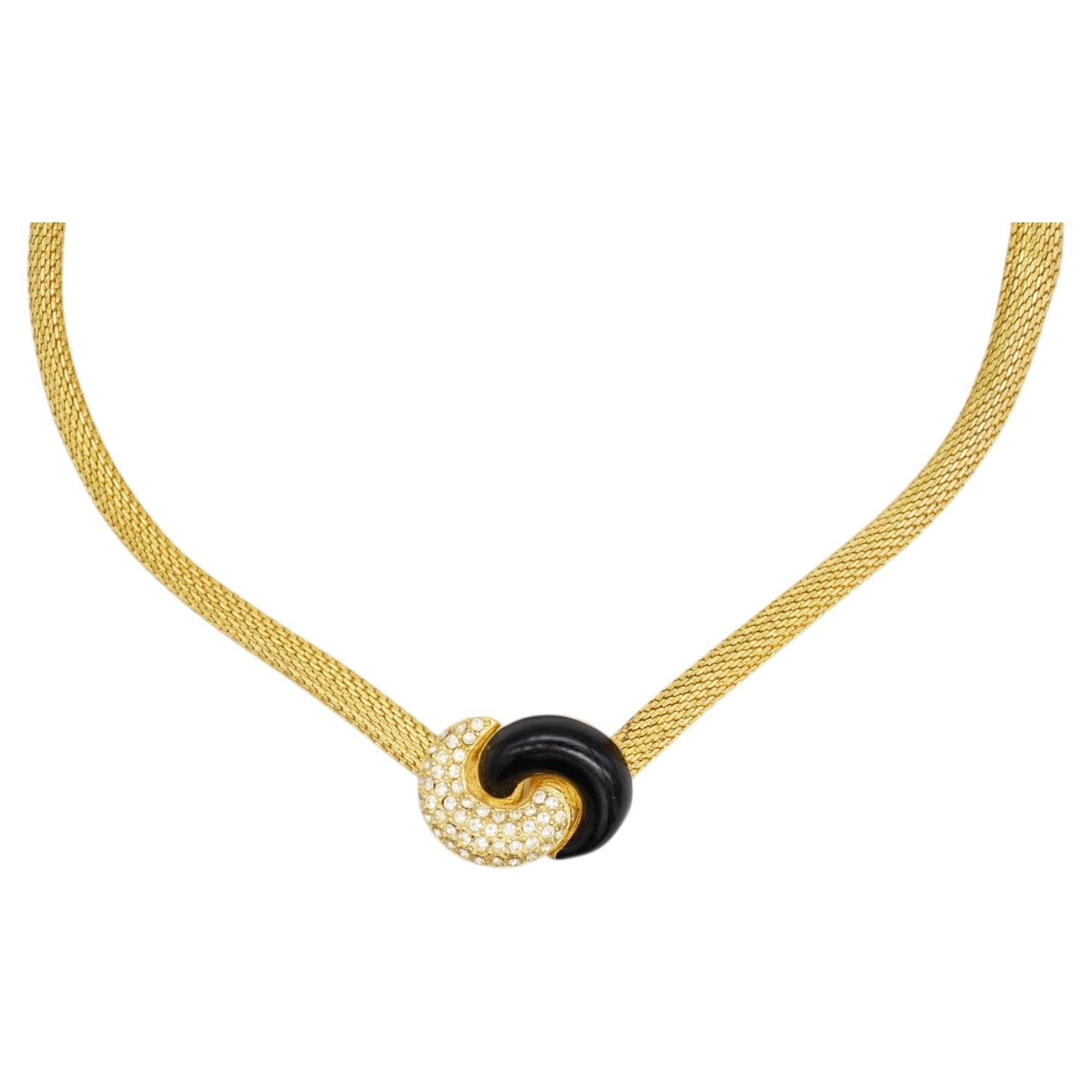 Collana Christian Dior vintage, rara, in oro e nero, con maglia intrecciata a forma di omega