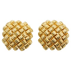 Boucles d'oreilles imposantes Christian Dior Vintage : modèle rare en maille ajourée tressée dorée