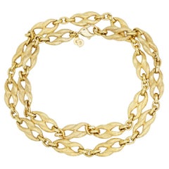 Collar largo vintage de Christian Dior, de oro, con eslabones de filigrana en forma de omega entrelazados, muy exclusivo