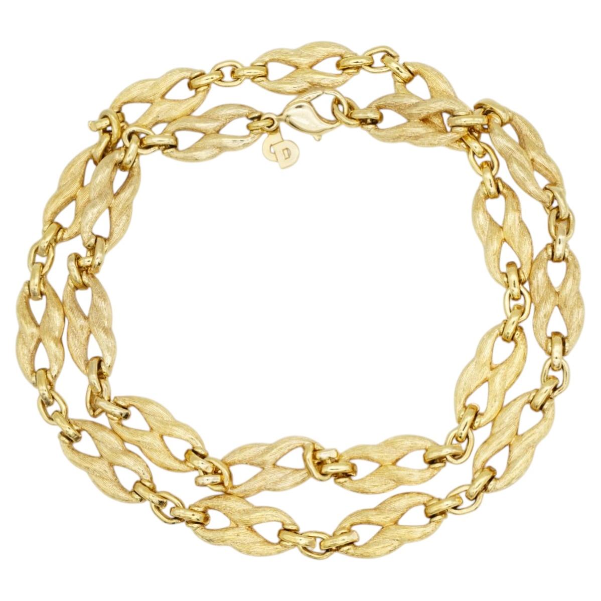 Collar largo vintage de Christian Dior, de oro, con eslabones de filigrana en forma de omega entrelazados, muy exclusivo