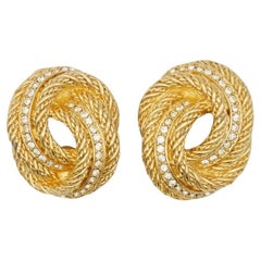 Boucles d'oreilles Christian Dior Vintage : modèle rare en or, avec grand nœud, torsadé, en spirale, en forme de corde et ornées de cristaux