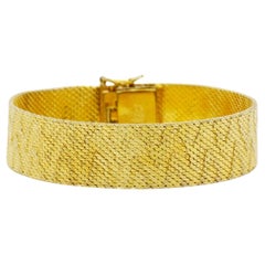 Bracelet vintage Christian Dior rare « GROSSE » de 1967, en maille tissée striée « Gold Flame »