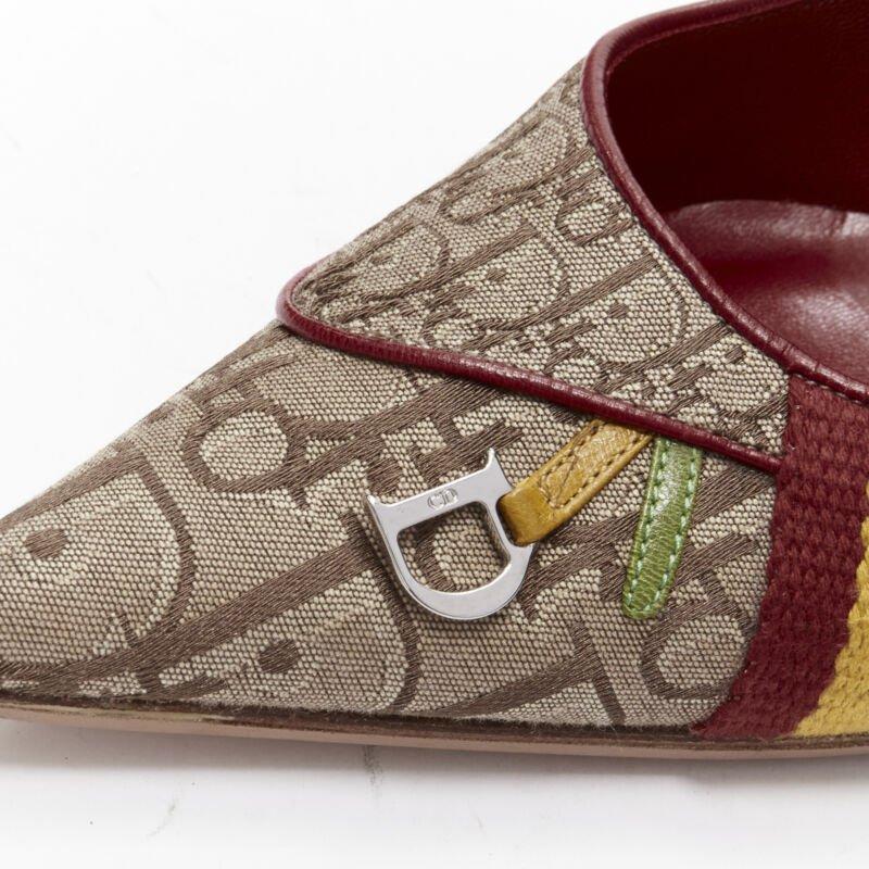 CHRISTIAN DIOR Vintage Rasta brown monogram web trim pigalle pump EU36.5
Reference: ANWU/A01054
Brand: Dior
Designer: John Galliano
Collection: Rasta
Material: Fabric
Color: Brown, Multicolour
Pattern: Monogram
Lining:  Leather
Extra Details: