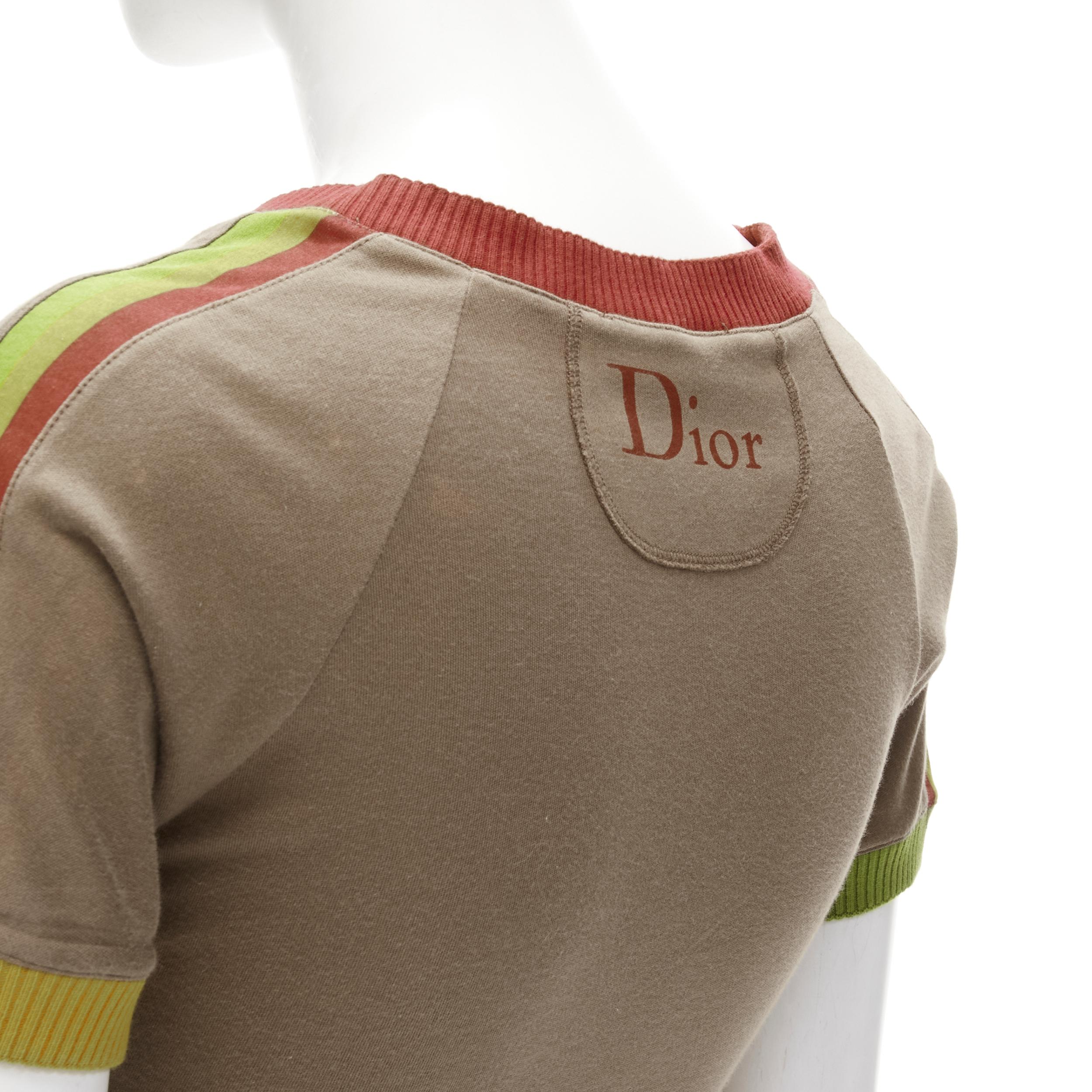 CHRISTIAN DIOR Vintage Rasta Y2K brown 1 logo V-neck t shirt XS 
Reference: ANWU/A00634 
Brand: Christian Dior 
Designer: John Galliano 
Collection: Rasta 
Material: Feels like cotton 
Color: Brown 
Pattern: Solid 
Extra Detail: Red ribbed trim