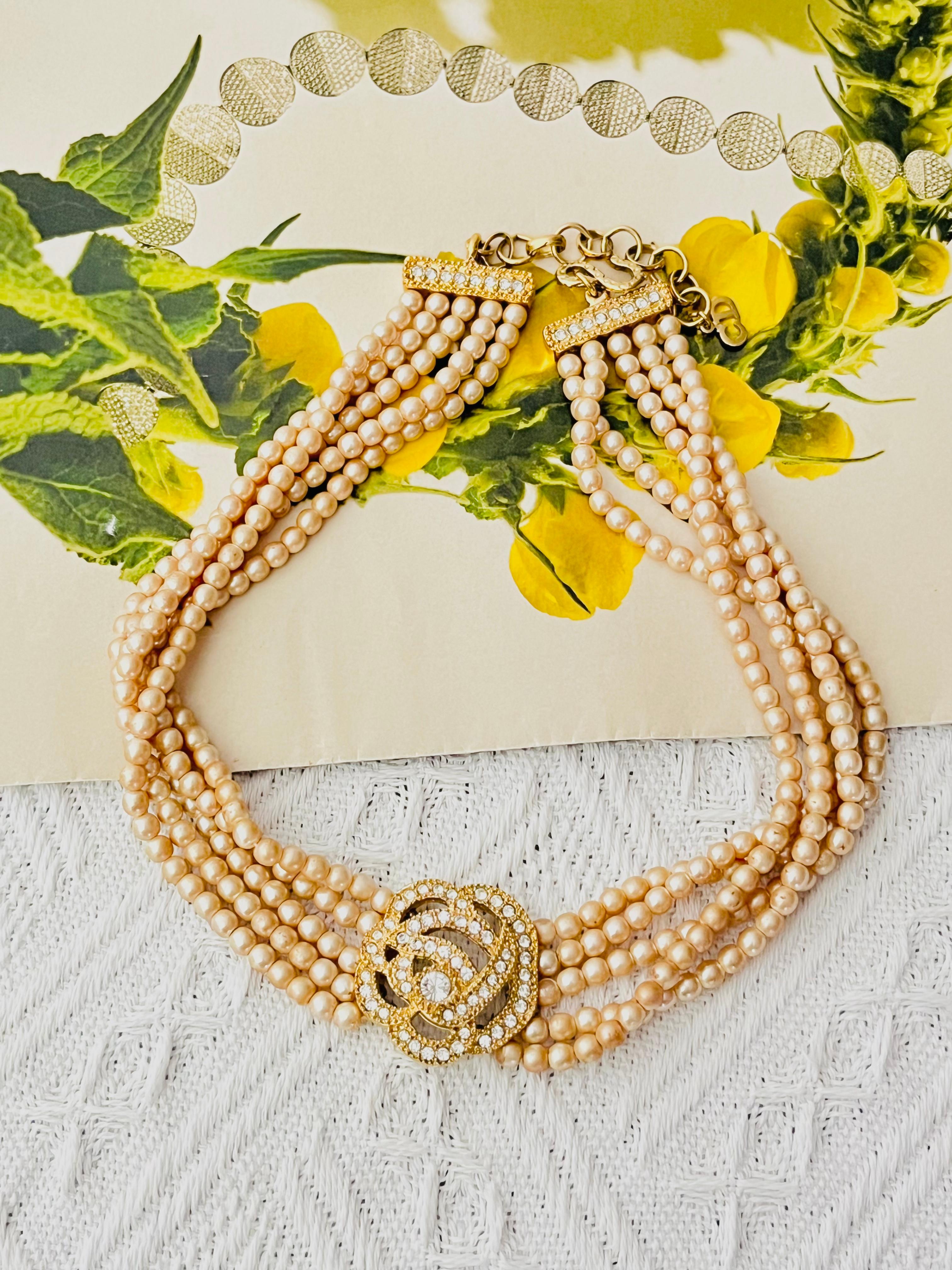 Christian Dior Vintage 1980s Rose Flower Openwork Crystals Pendant Beads Pearls Five 5 Layers Strands Balls Choker Collar Elegant Necklace, Gold Tone

Very good condition. Not any stones lost, light peel off at faux pearls, barely noticeable. 100%