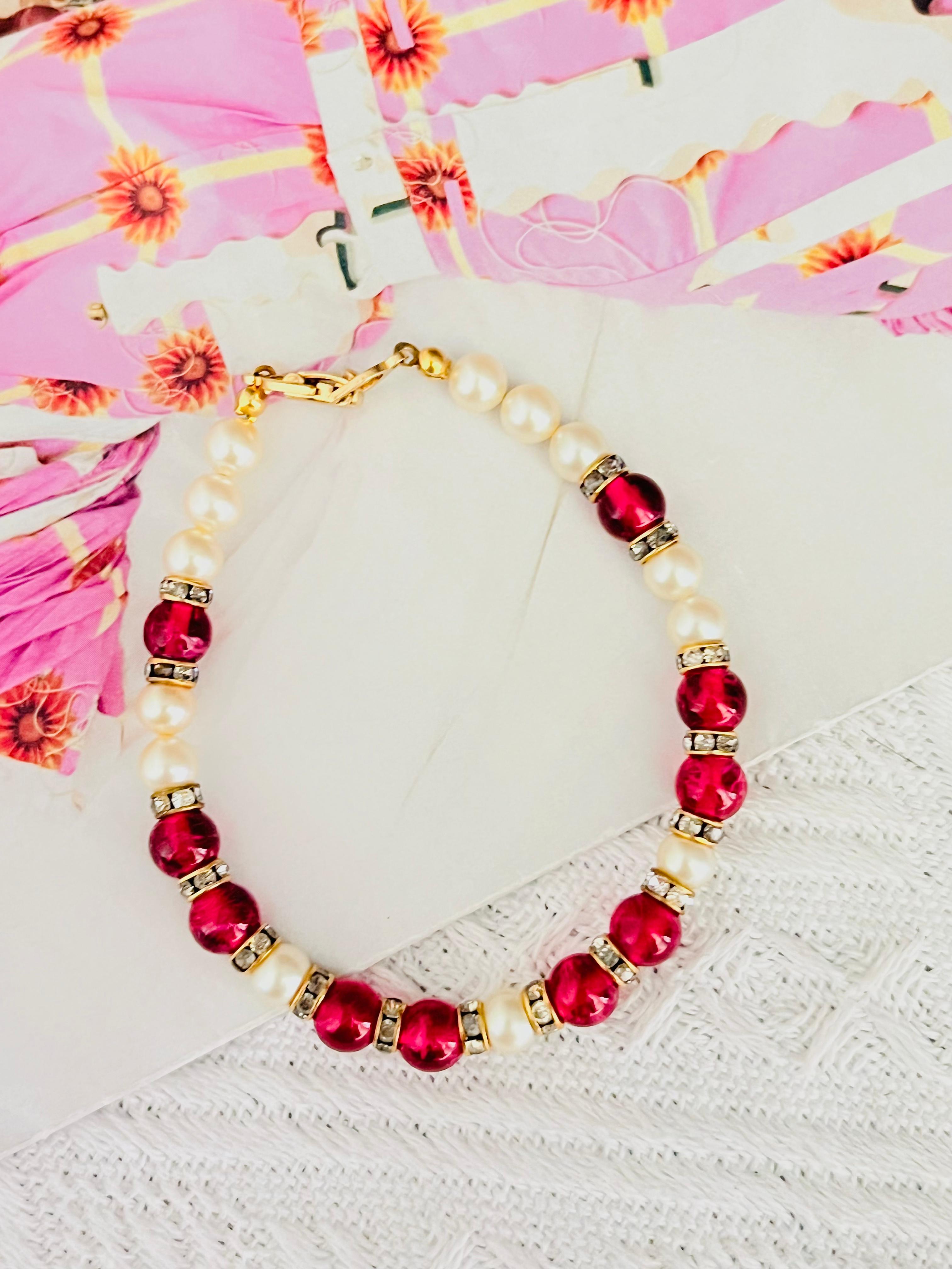 Christian Dior Vintage 1980s Ruby Red Cabochon White Beads Pearls Ball Circle Round Crystals Tennis Link Elegant Modernist Bracelet, Gold Tone

Very good condition. Not any stones lost, only some of rhinestones are shine off, barely noticeable. 100%