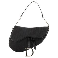 dior houndstooth saddle bag Christian Dior Vintage Saddle Bag Diorissimo Canvas Medium