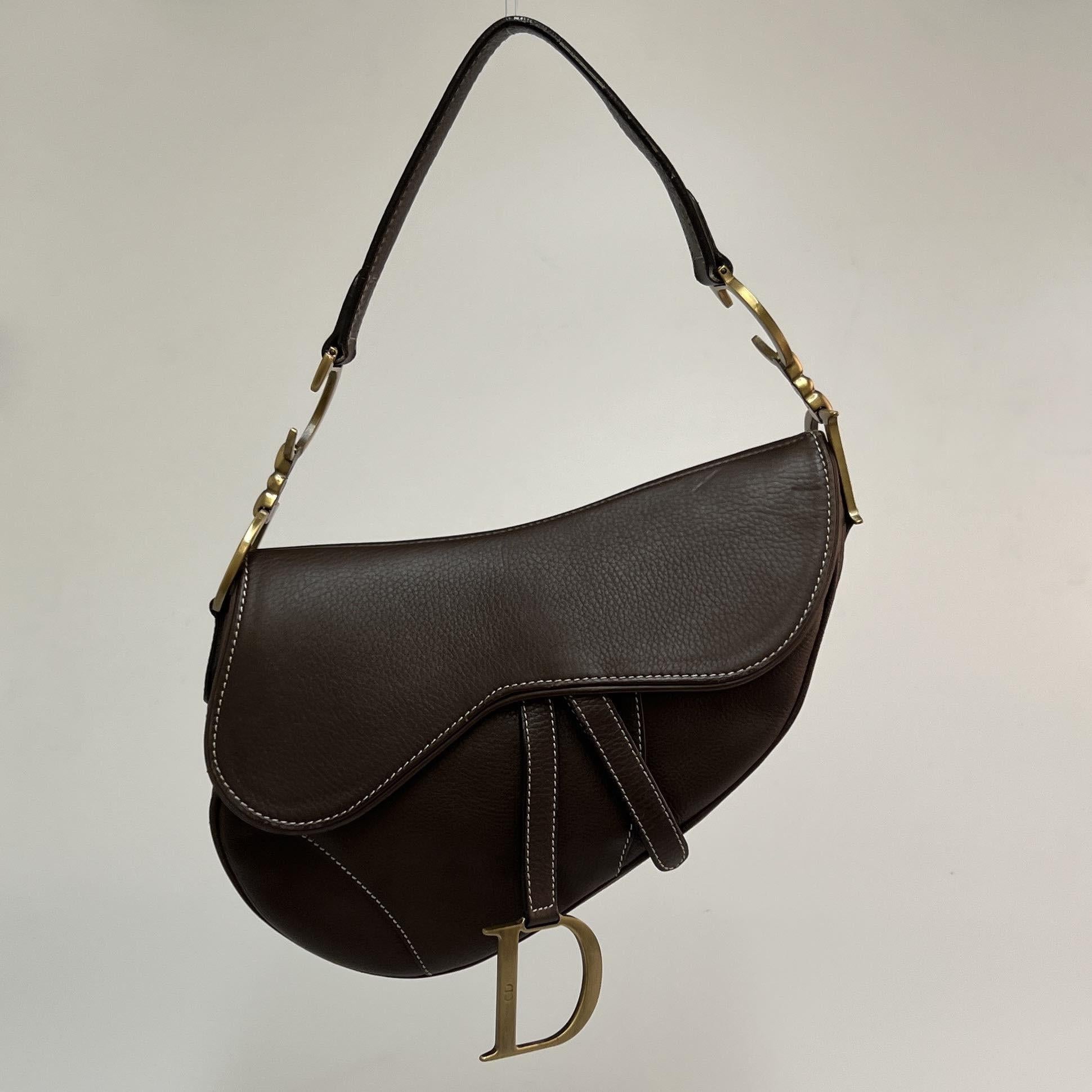 brown leather dior saddle bag