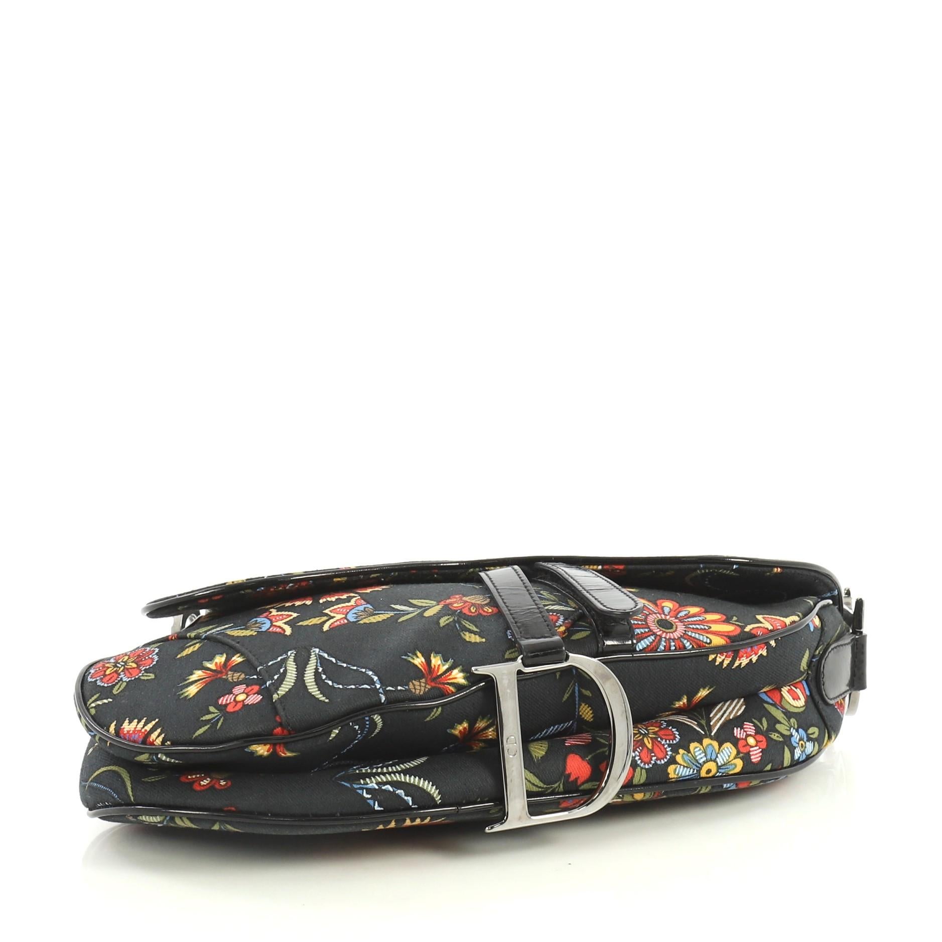russia dior saddle bag