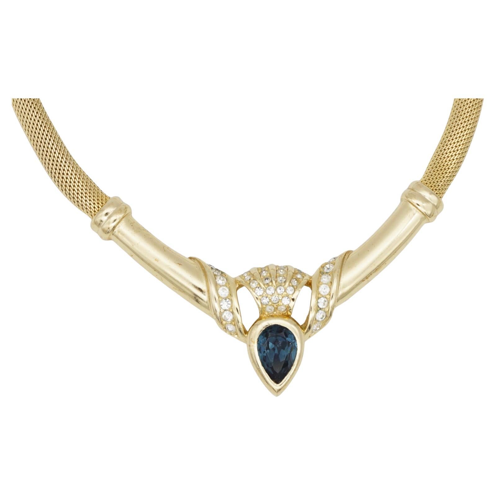 Christian Dior Vintage 1980s Sapphire Navy Blue Peacock Feather Tear Water Drop Crystals Triangle Openwork Pendant Omega Mesh Woven Collar Choker Necklace, Gold Tone

Very excellent condition. 100% Genuine. 

Marked 'Chr.Dior (C) '. Very rare to