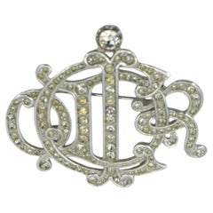 Christian Dior Vintage Silver Metal Crystals Monogram Brooch