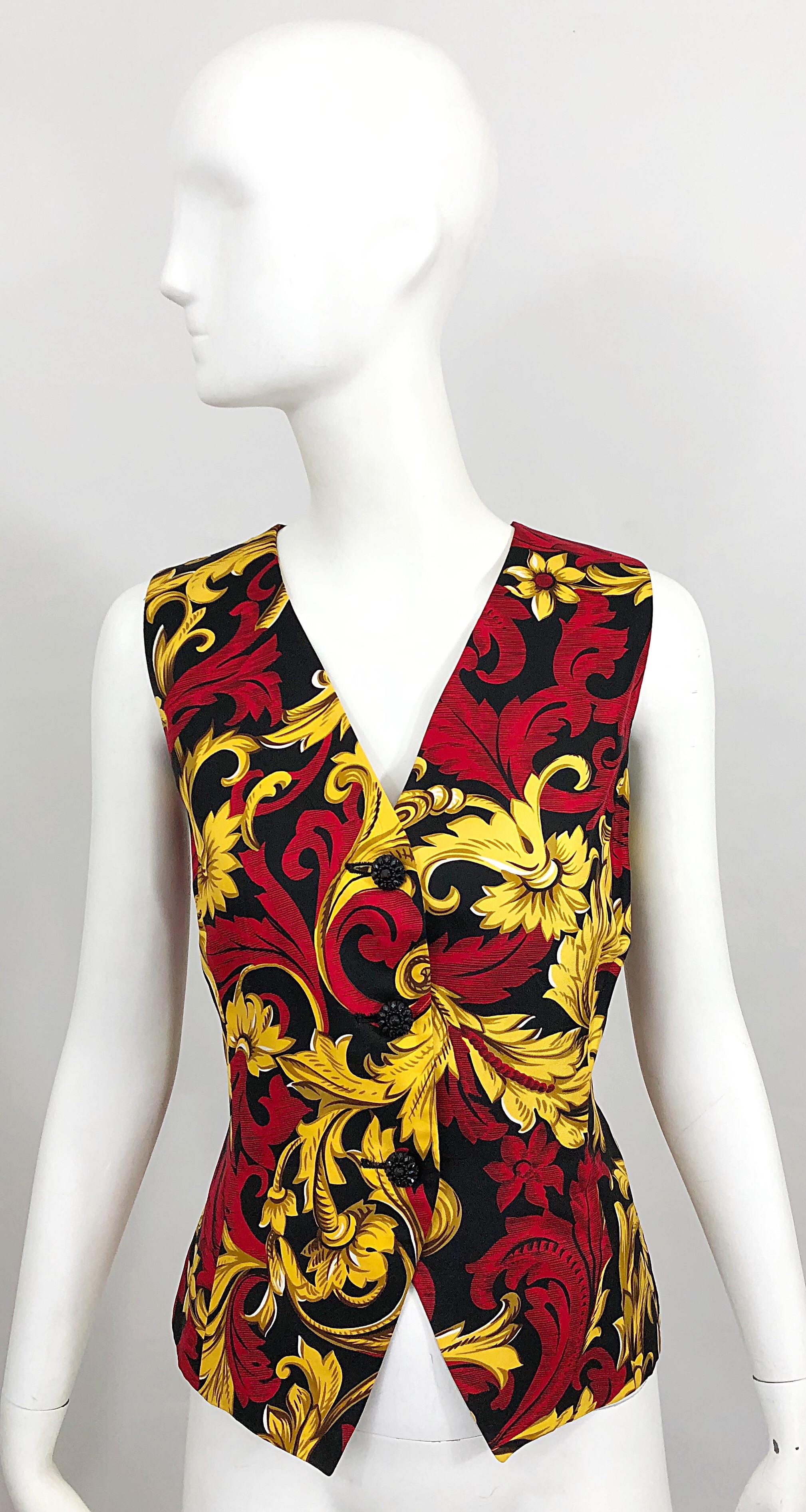 Beautiful vintage women’s CHRISTIAN DIOR 1990s silk Size 10 vest! Bright colors of red, gold and black. Beautiful carved buttons up the front. Great alone with jeans, slacks, or a skirt. Or, can pair over a blouse or turtleneck. In great condition