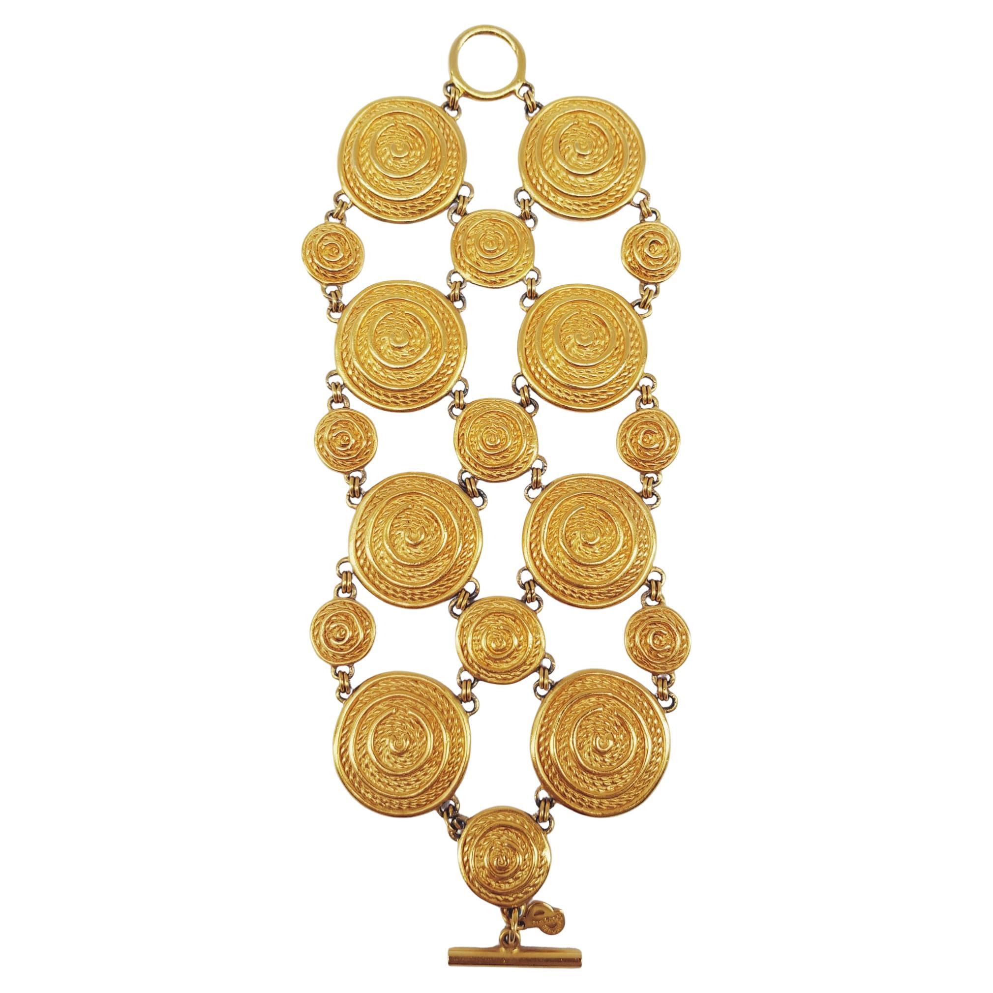 Seltene CHRISTIAN DIOR Vintage spiralförmige goldene Manschette im Angebot