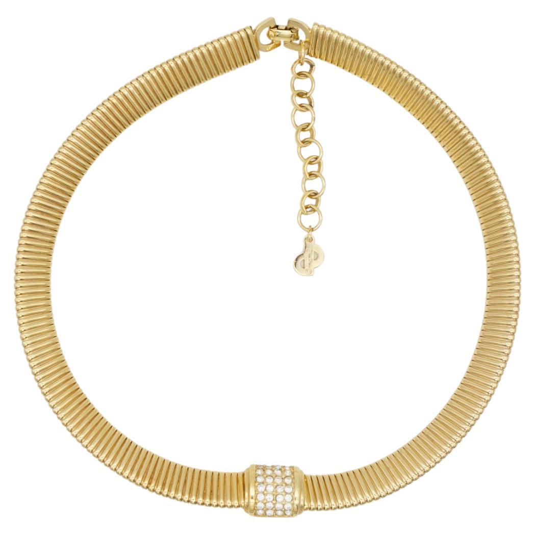 Christian Dior Vintage 1980s Square Crystals Pendant Adjustable Choker Omega Collar Necklace, Gold Plated

Very excellent condition. Marked 'Chr.Dior (C) '. Rare to find. 100% Genuine.

This pieces dates to the 1980s and features a broad timeless