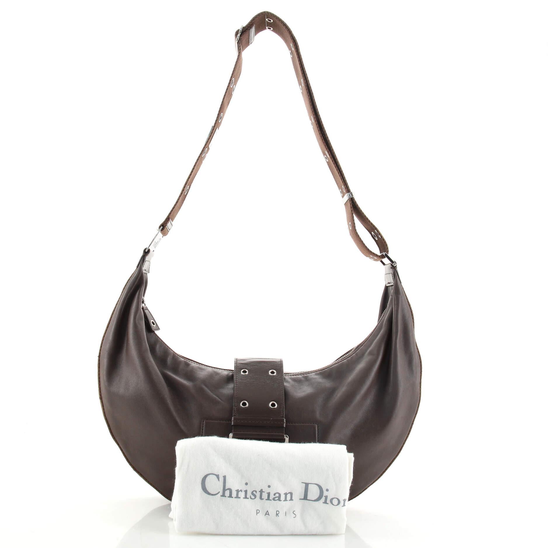 Condition: Good. Creasing, moderate wear and scuffs on exterior, wear and discoloration on strap, heavy splitting and peeling on zipper pull wax edges. Minor wear and marks in interior, scratches on hardware.
Accessories: Dust Bag
Measurements: