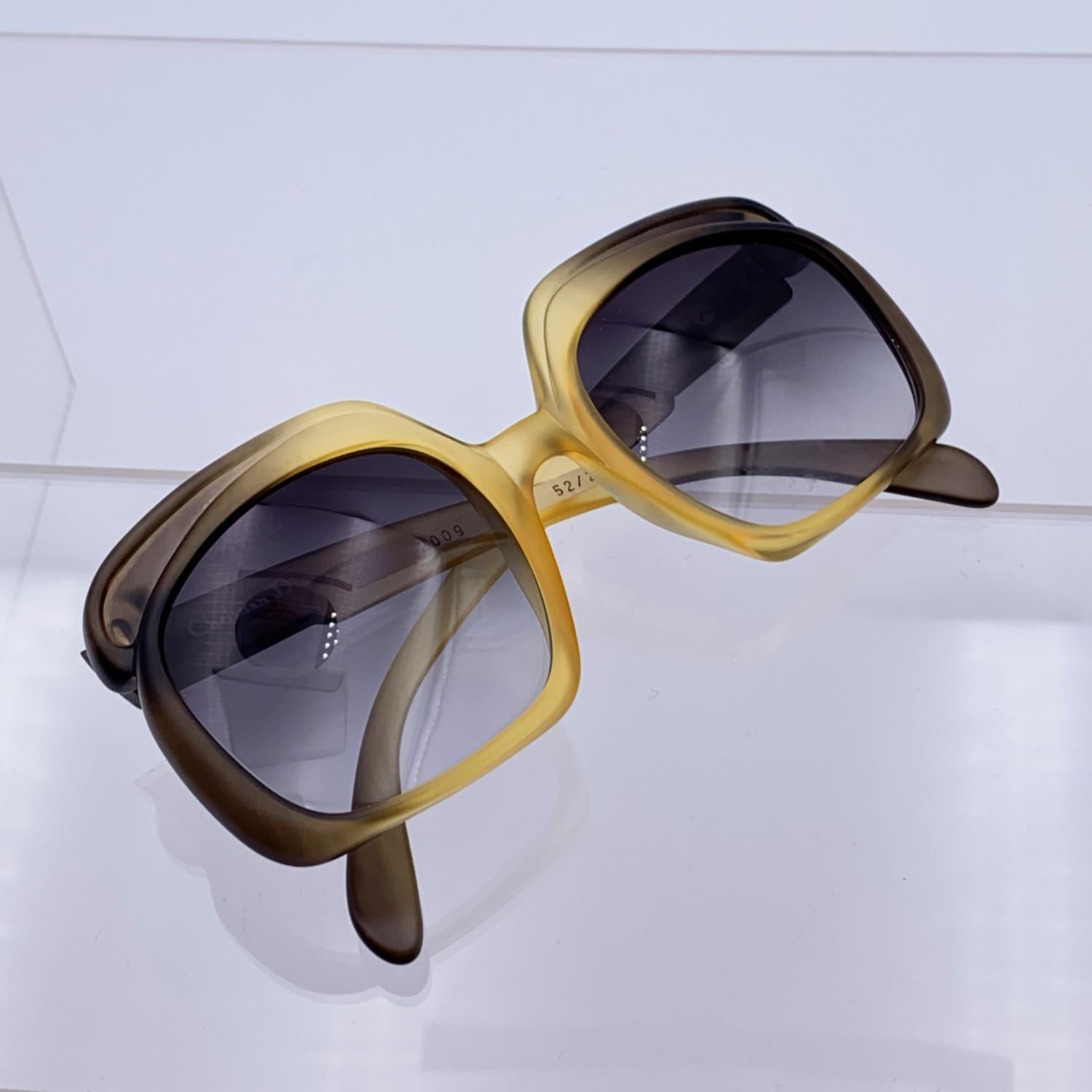 Vintage Christian Dior oversize sunglasses, Mod. 2009- Col D 272. Ombre' yellow and dark green Optyl frame.. Original 100% Total UVA/UVB protection in gradient grey color. CD logo on temples. Made in Germany

Details

MATERIAL: Acetate

COLOR: