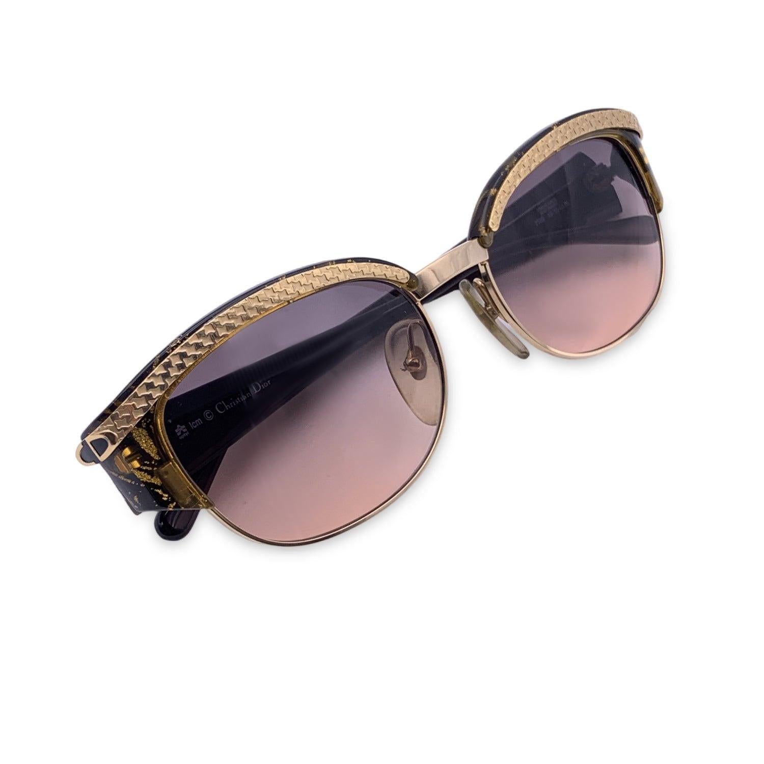 Vintage Christian Dior Sunglasses, Mod. 2589 49 - 55/18 - 135mm. Marbled gold and black Opyl Frame, with gold metal finish. Original 100% Total UVA/UVB protection in gradient & bi-color lenses. CD logo on temples. Details MATERIAL: Plastic COLOR: