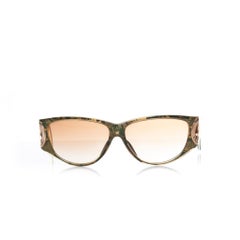 Christian Dior, Vintage-Sonnenbrille in Grün und Gold.