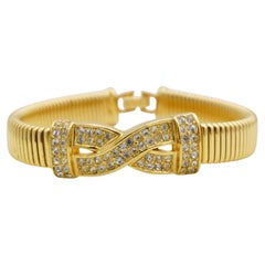 Christian Dior Vintage Unisex Crystals Gold Cross Interlocked Omega Bracelet