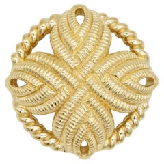Spilla Christian Dior Vintage unisex con croce rotonda in oro traforata, trifoglio e fiocco intrecciato