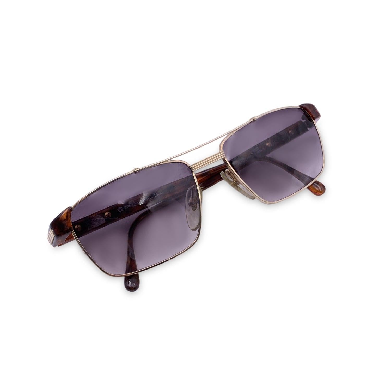 Vintage Christian Dior Unisex Sunglasses, Mod. 2678 10 Optyl. Size: 56/17 140mm. Gold metal frame with brown acetate temples. Gold CD logo con temples . 100% Total UVA/UVB protection. Brown gradient lenses. Details MATERIAL: Metal COLOR: Gold MODEL: