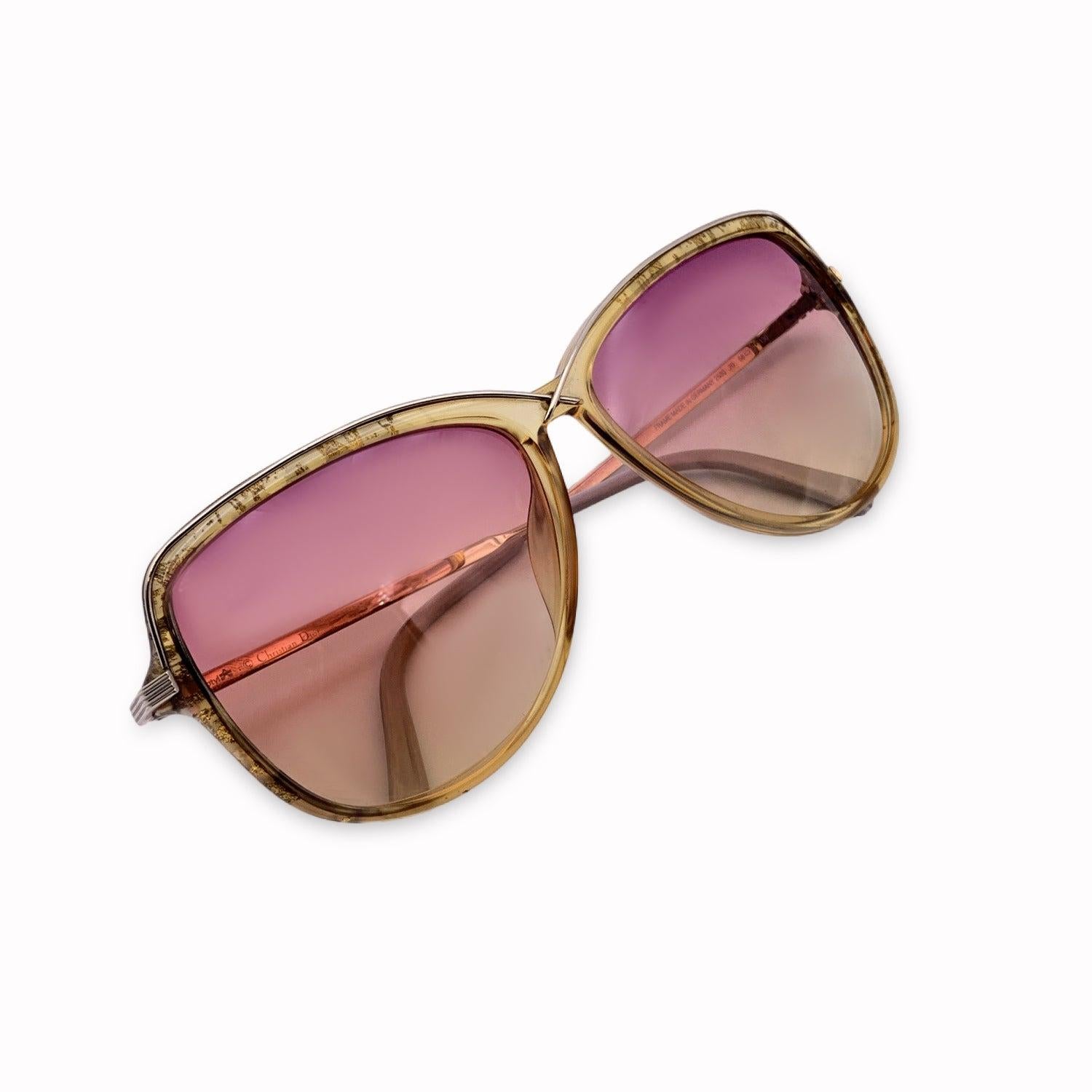 Vintage Christian Dior Women Sunglasses, Mod. 2530 20 Optyl. Size: 58/13 130mm. Beige acetate frame with gold metal finish. CD logo con temples . 100% Total UVA/UVB protection. Pink gradient lenses. Details MATERIAL: Plastic COLOR: Beige MODEL: 2530