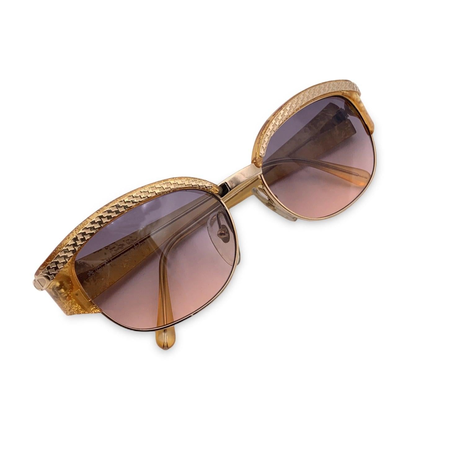 Vintage Christian Dior Women Sunglasses, Mod. 2589 44 Optyl. Size: 55/18 130mm. Orange plastic frame with a gold detail on the upper frame, with CD logo on temples. 100% Total UVA/UVB protection. Brown gradient lenses. Details MATERIAL: Plastic