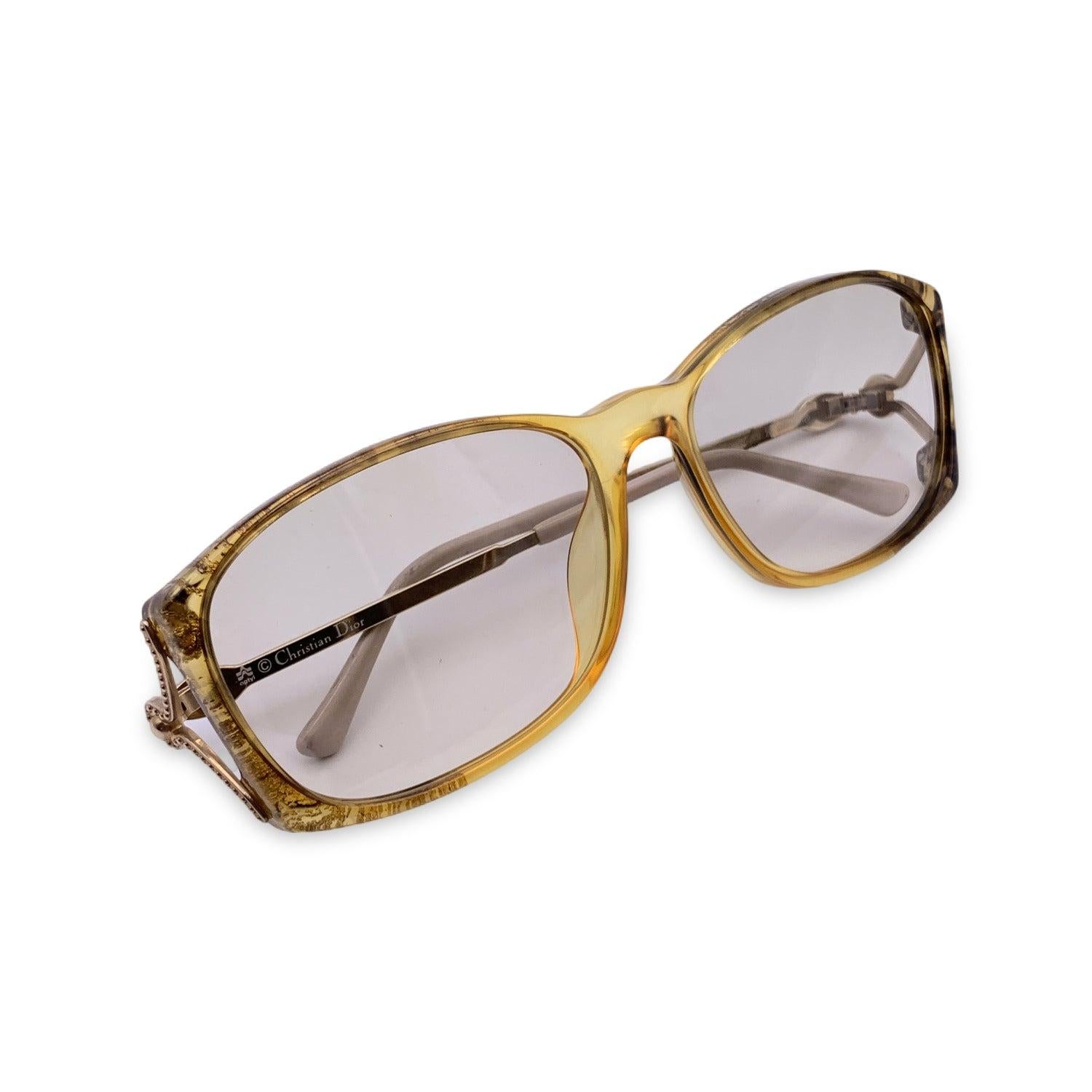 Vintage Christian Dior Women Sunglasses, Mod. 22632 20 Opty. Size: 57/16 120mm. Transparent beige acetate frame, with a metal golden effect on the sides. Gold dots effect on temples with a white finish. Gold CD logo con temples . 100% Total UVA/UVB