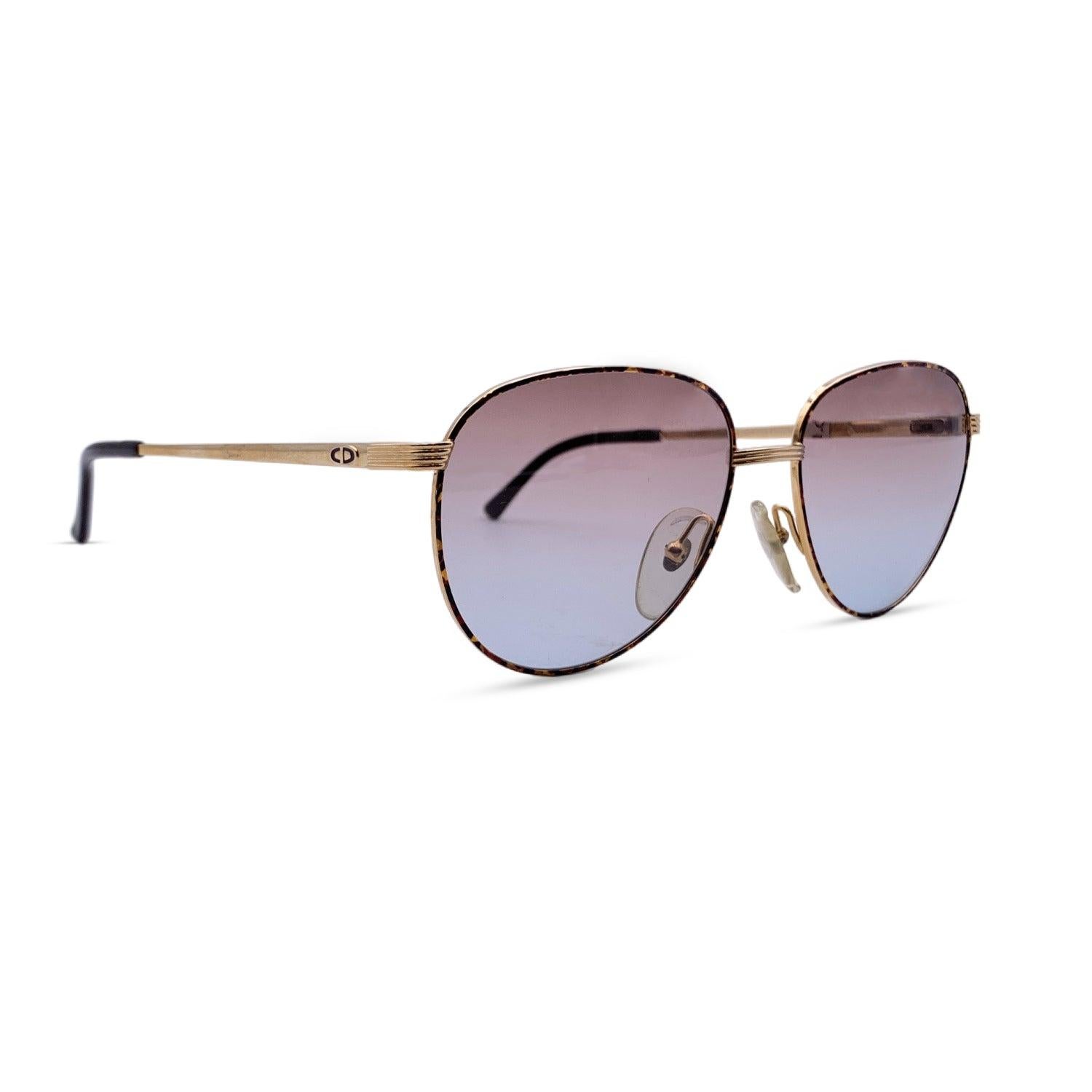Vintage Christian Dior Women Sunglasses, Mod. 2754 41. Size: 55/17 140mm. Browned Gold frame , with CD logo on temples. 100% Total UVA/UVB protection. Brown gradient lenses, shades of lenses from brown to blue. Details MATERIAL: Metal COLOR: Gold